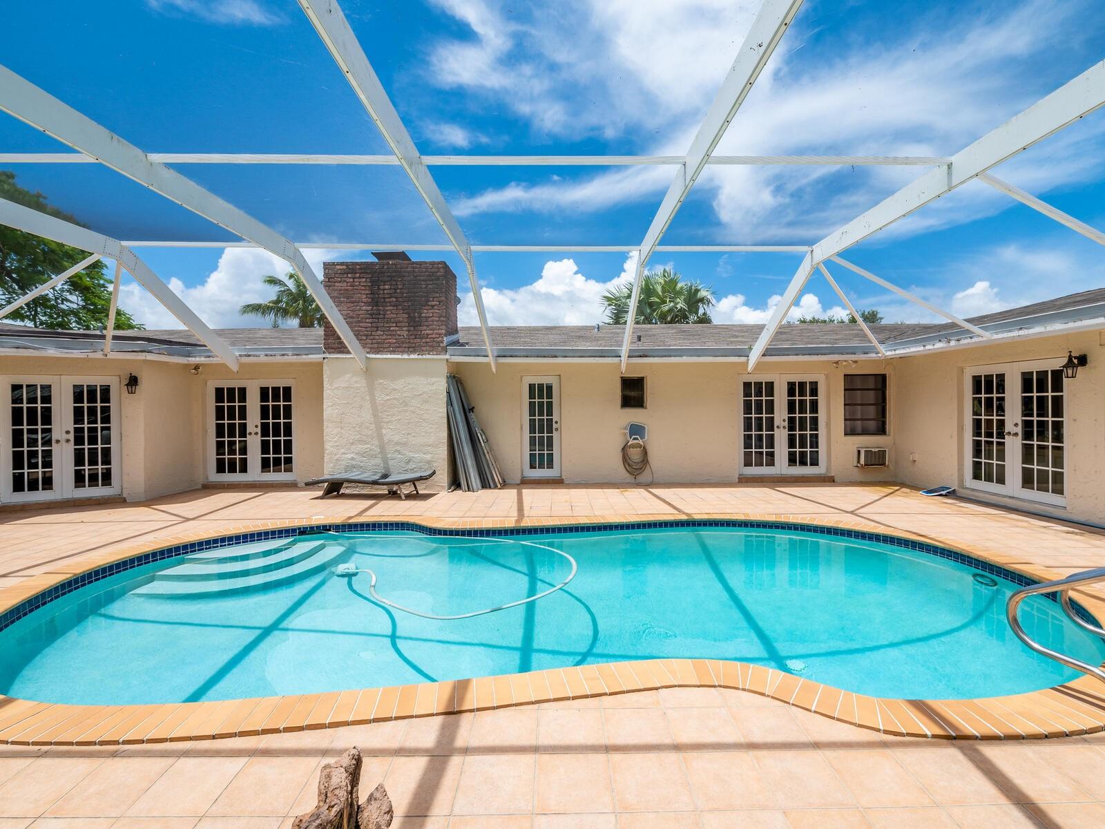 ALL FRENCH DOORS TO PATIO ARE IMPACT