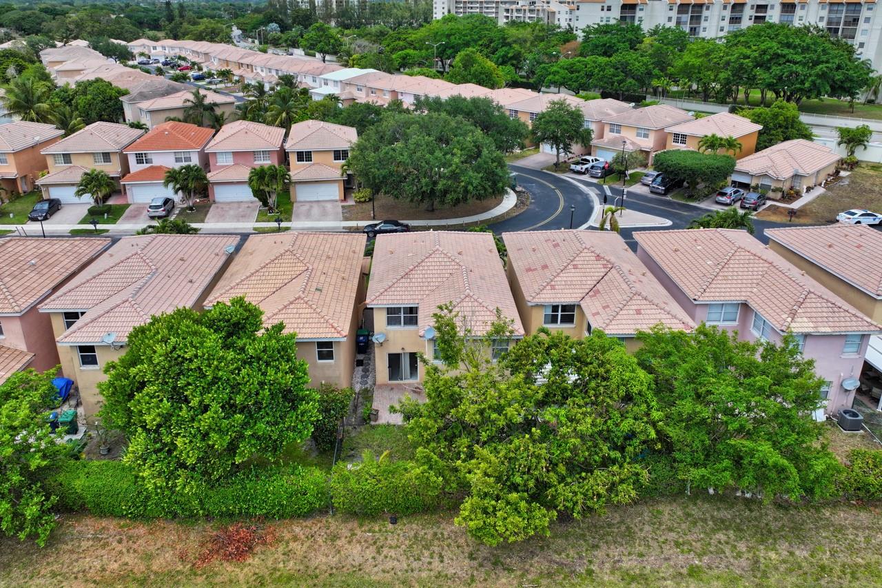 Large green space behind the property offers privacy