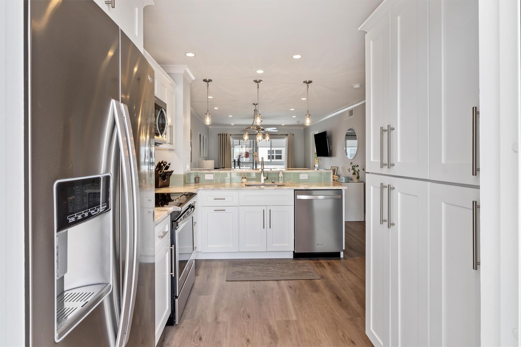 Counter Depth Refrigerator - Stainless Steel Appliances and Pantry Storage