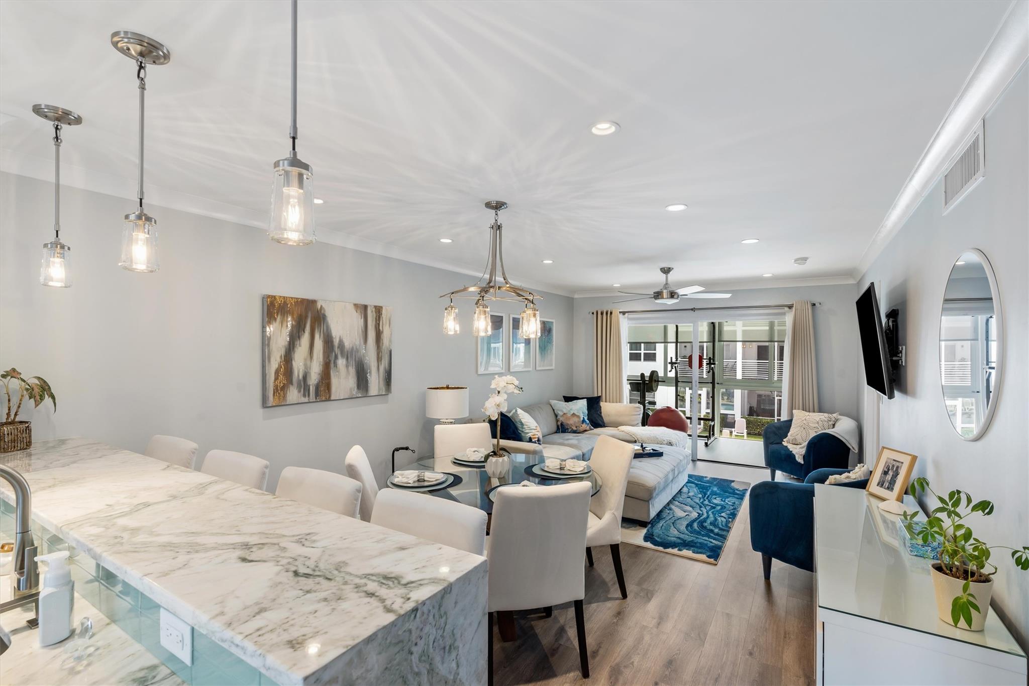 Dining and Living Room leading to Enclosed Patio