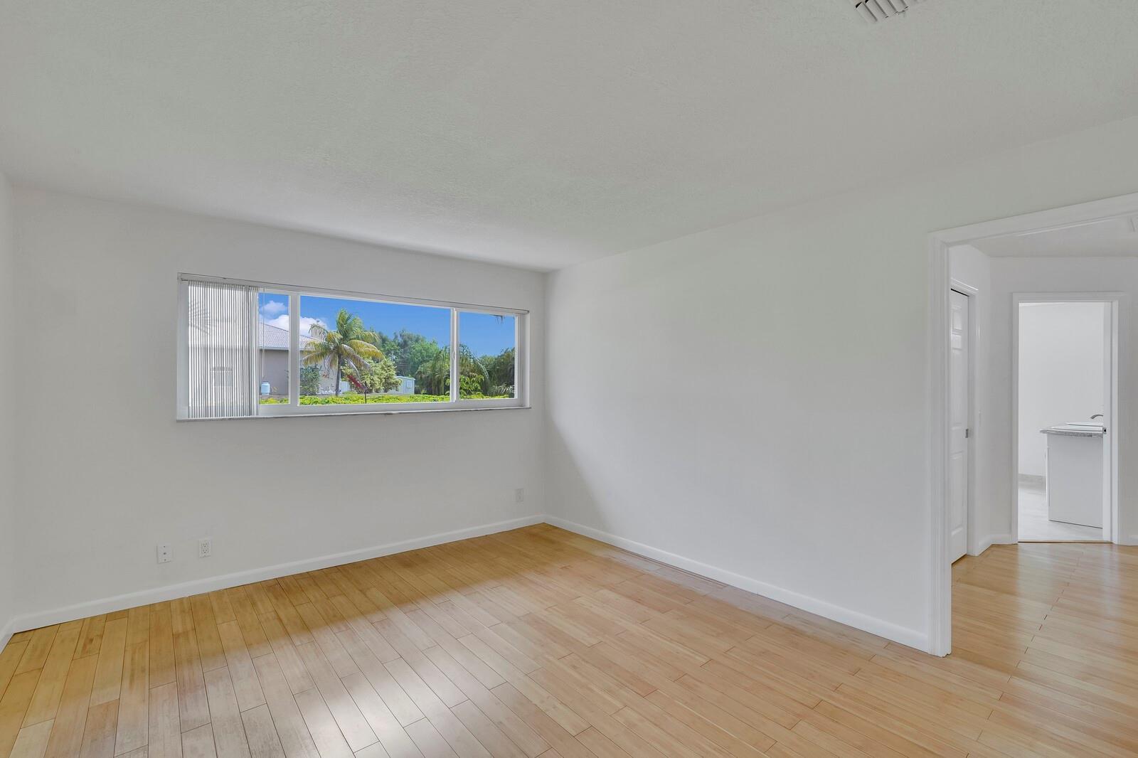 Office entry to living room and to MB