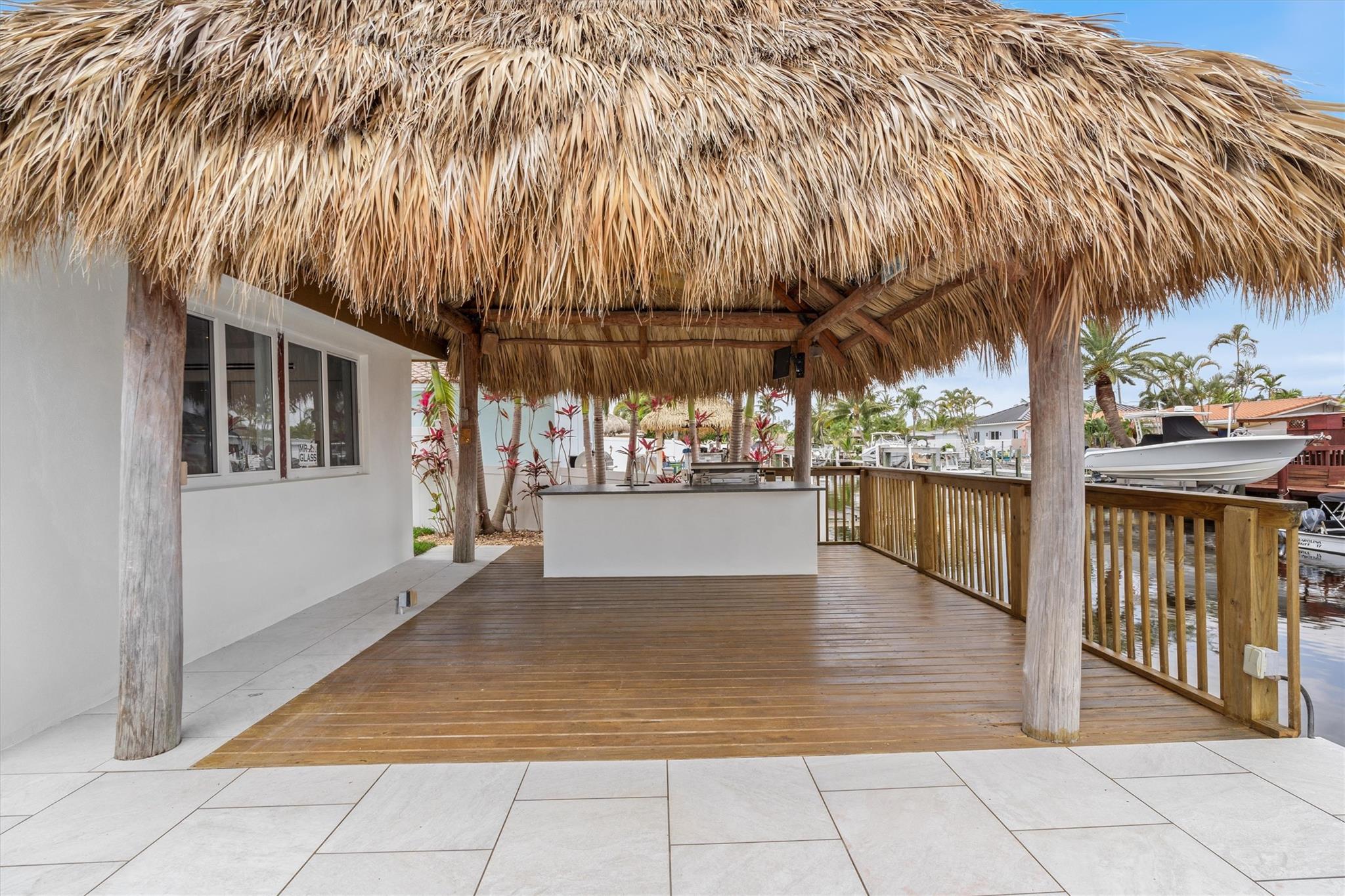 Tiki Hut With Built-in Grill And Bar Sink