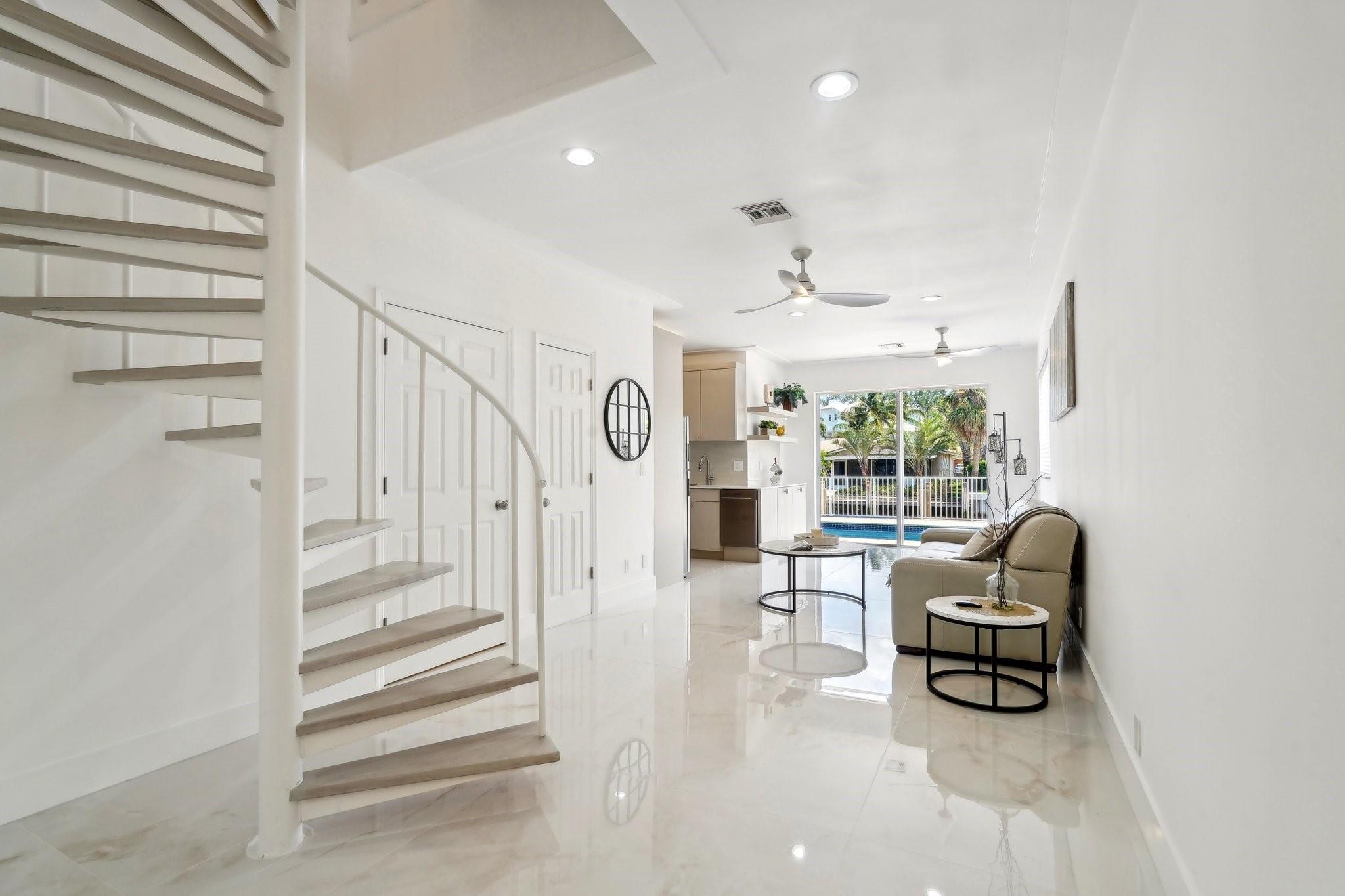 In law side 3/2 with private wood staircase