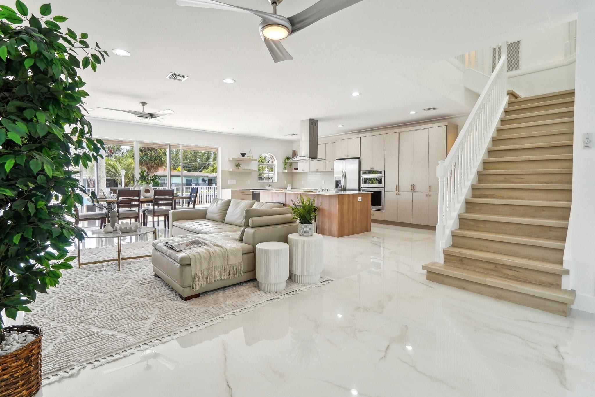 Stunning massive porcelain flooring throughout first floor