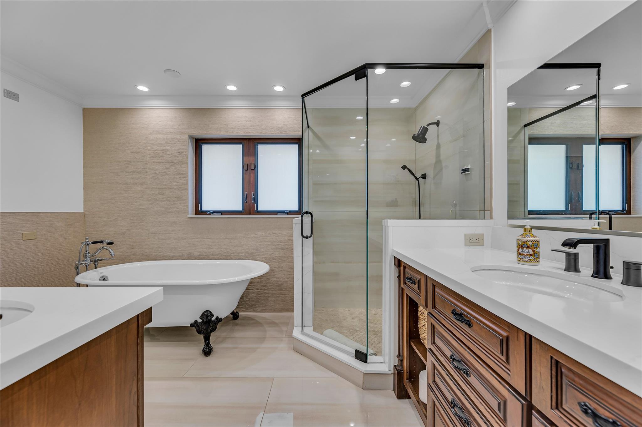 Master bathroom with walk in shower and separate free standing claw tub