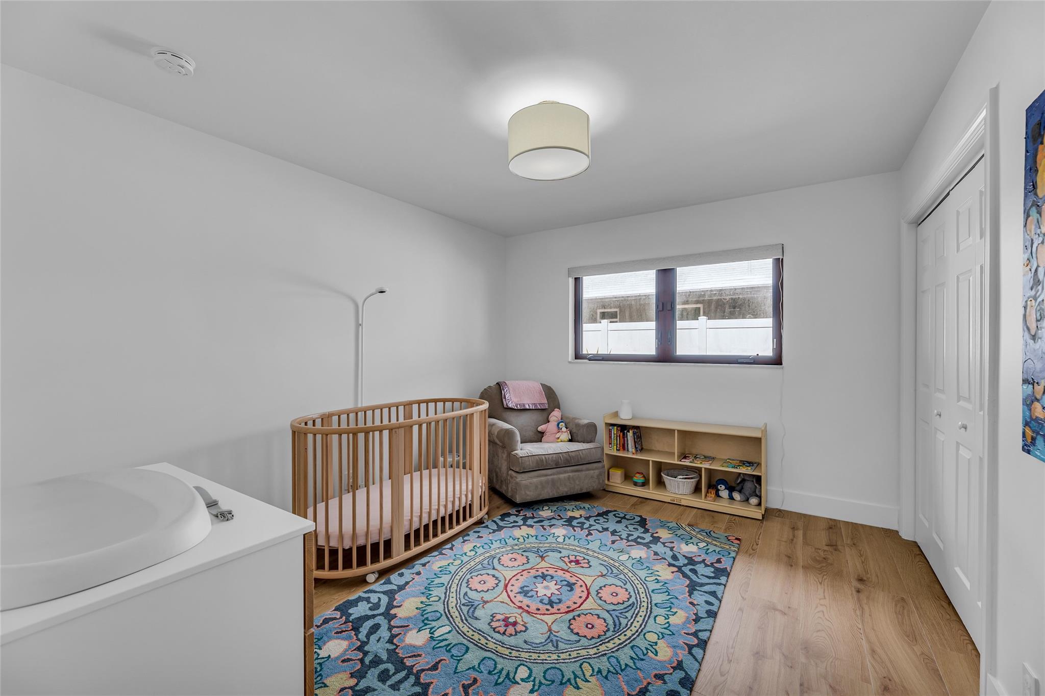 Second Bedroom offers electric shades and great natural light