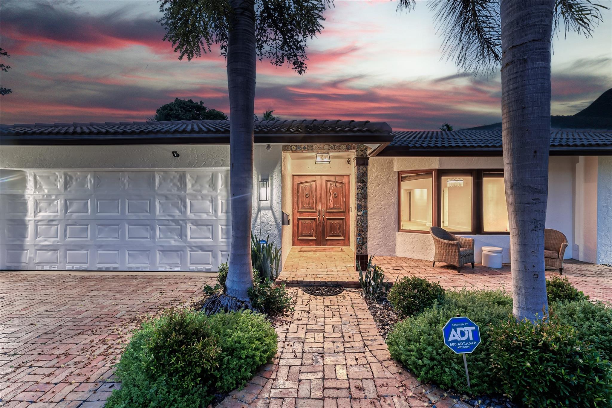 Chicago Brick pavered driveway and walkway add to the charm of this great home