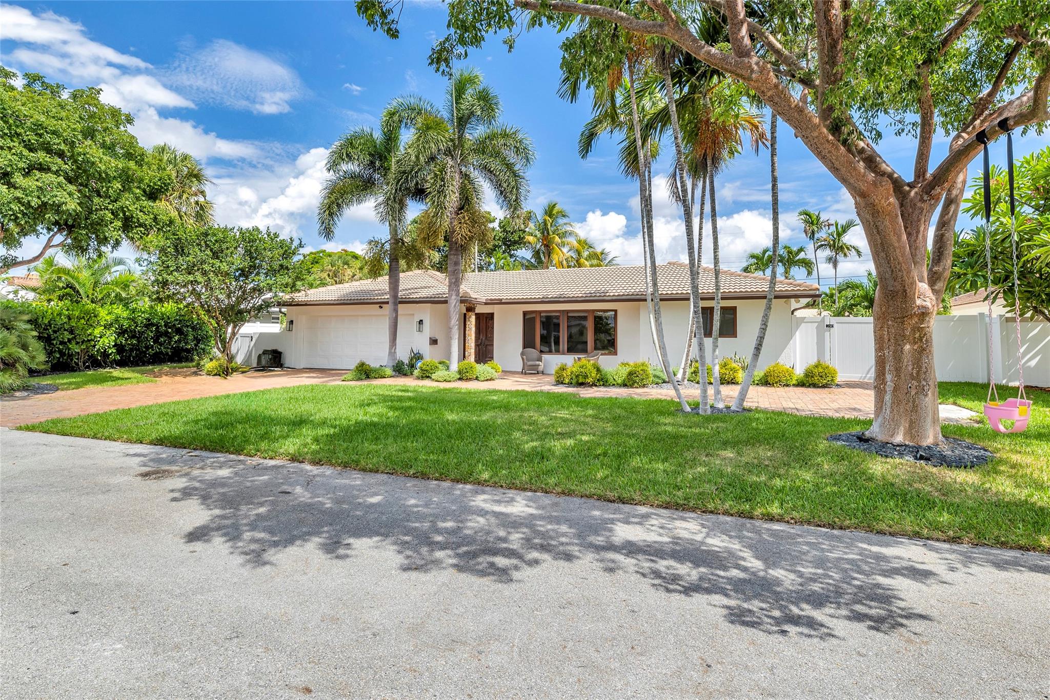 Freshly painted 4 Bedroom / 4 bath / 2 Car Garage home in desirable Lighthouse Point