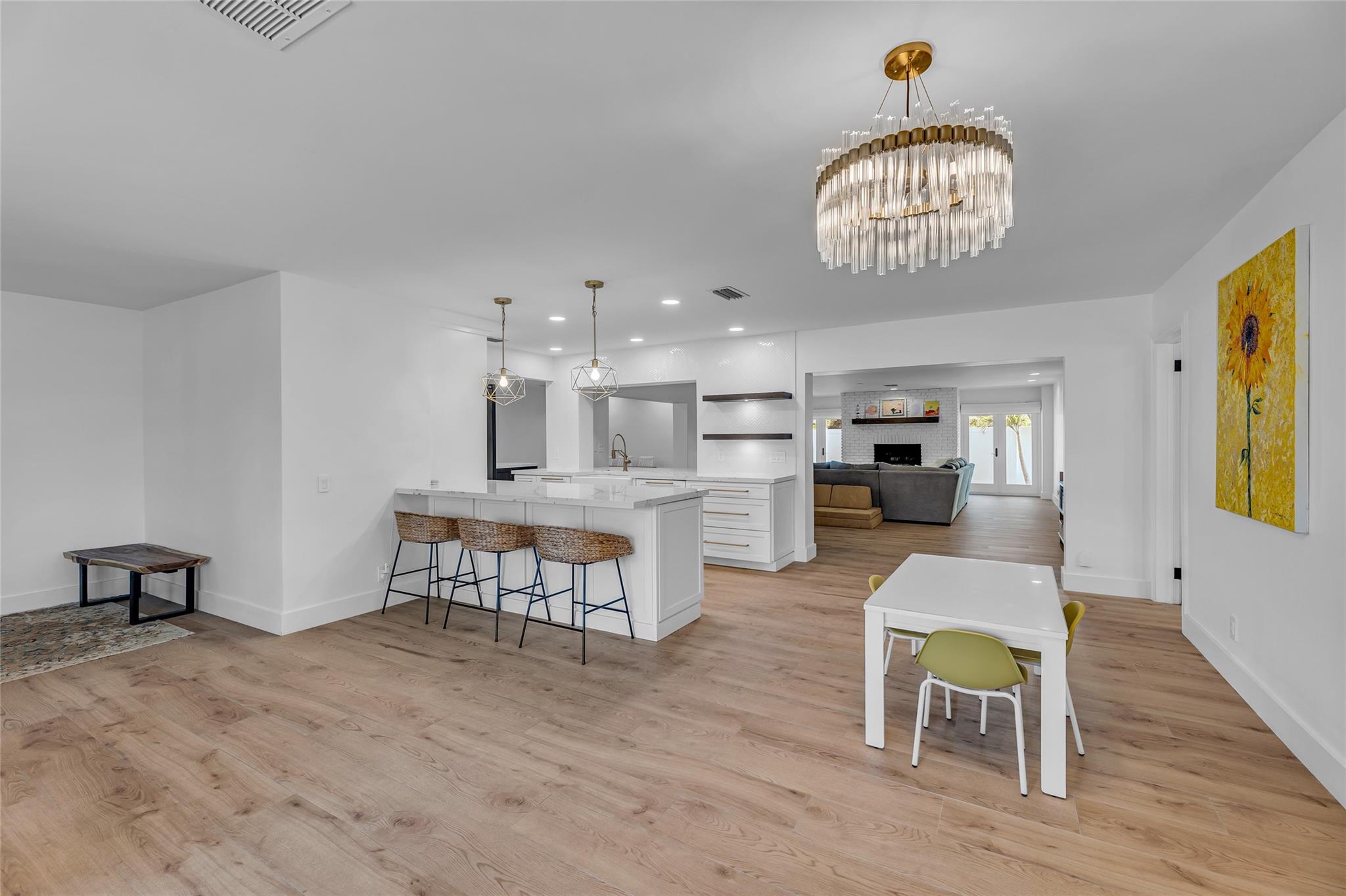 Dining room and large breakfast bar with open and spacious kitchen