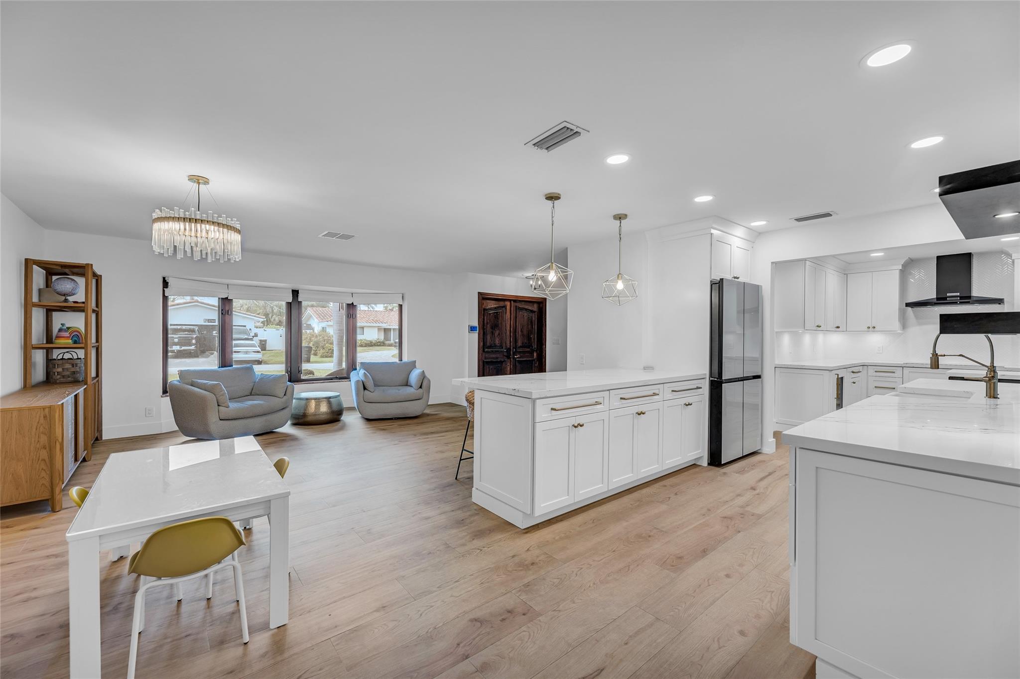 Open and spacious kitchen, dining room and living room is the perfect space for entertaining