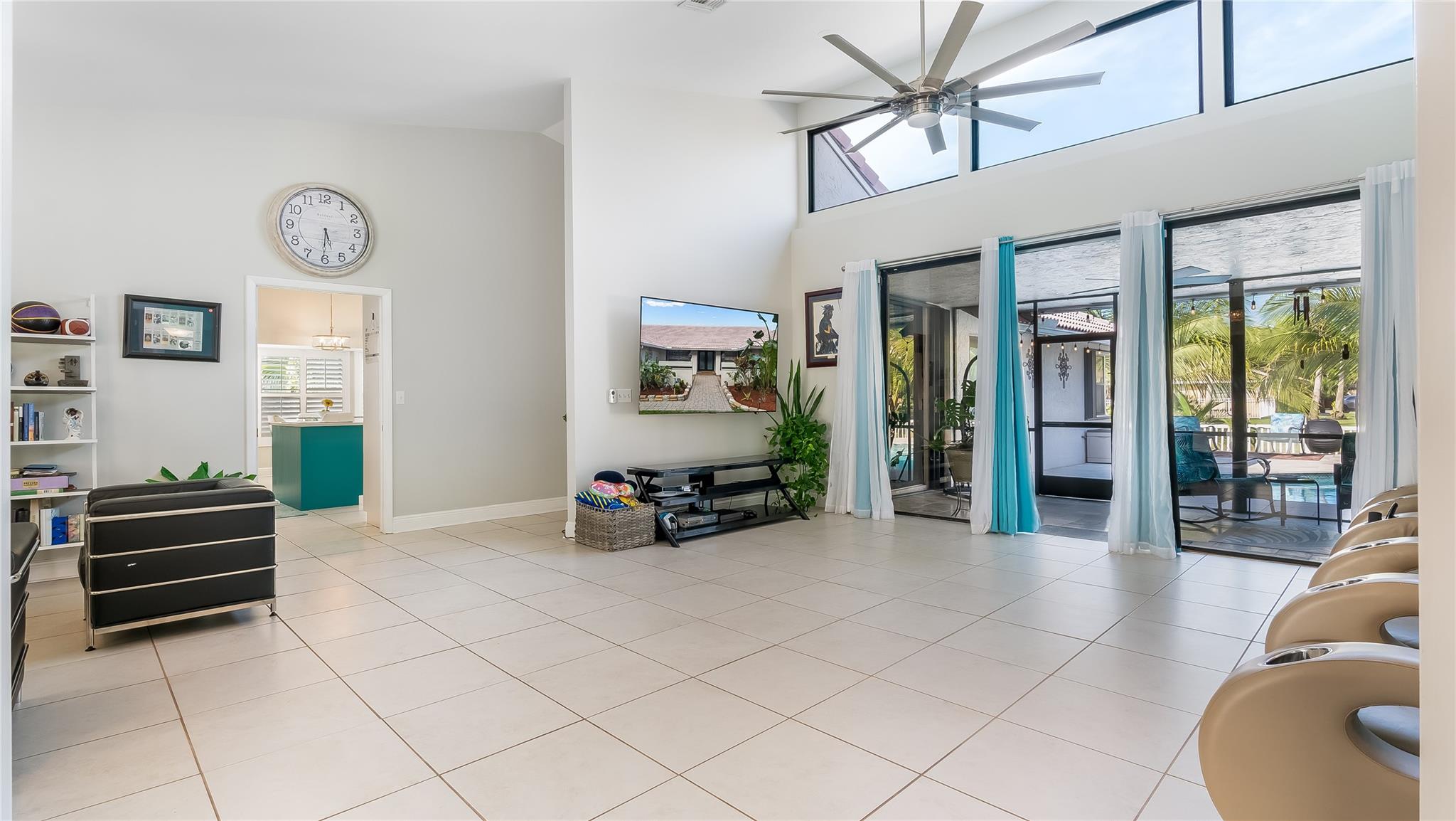 Step into the epitome of modern elegance with this open-concept living room, a central feature of the home