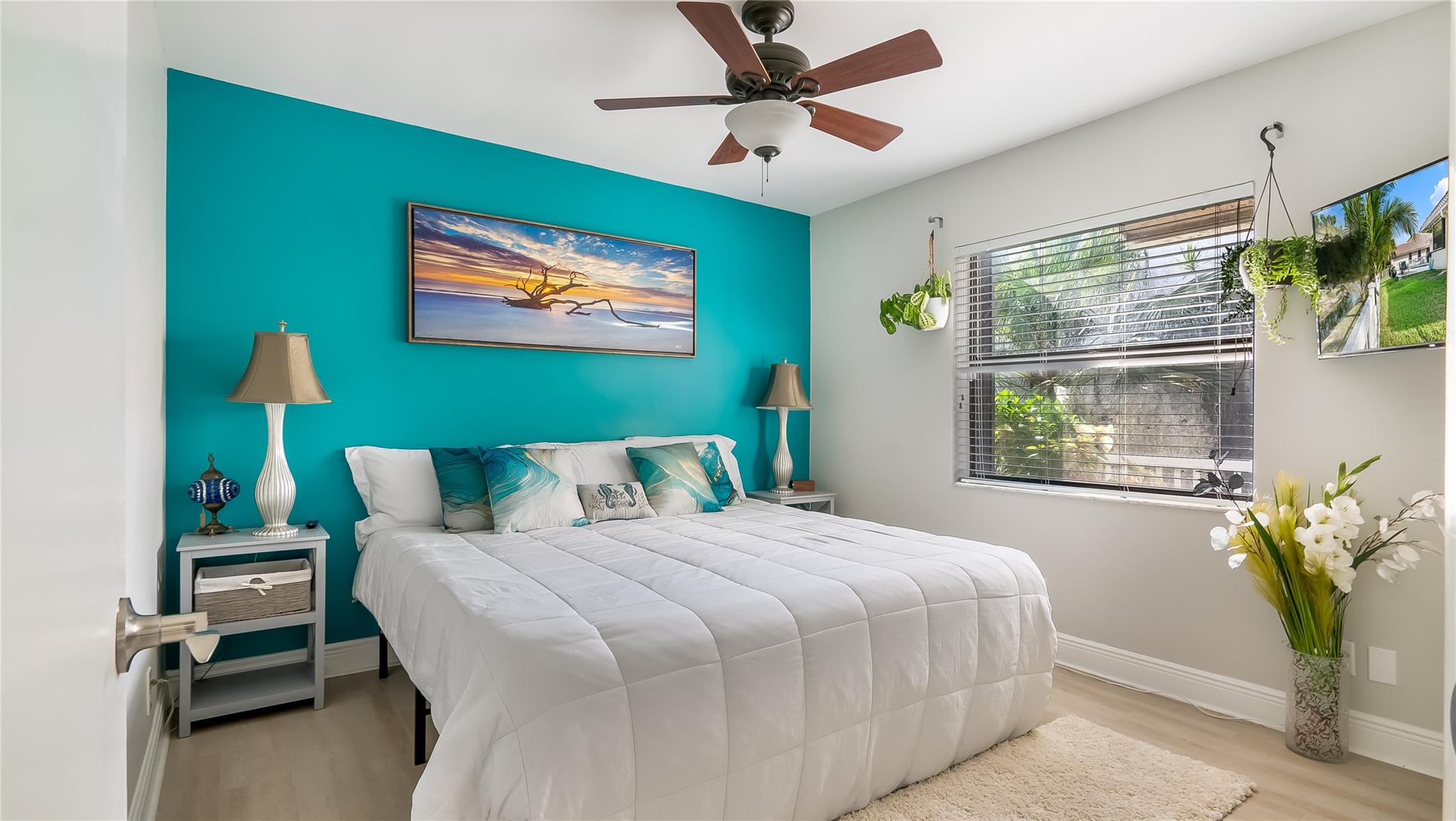 Enjoy the warm sunlight and relaxing vibes in this large room, serenely tucked away. Equipped with custom closet organizational system that allows you to maximize the space in the bedroom.