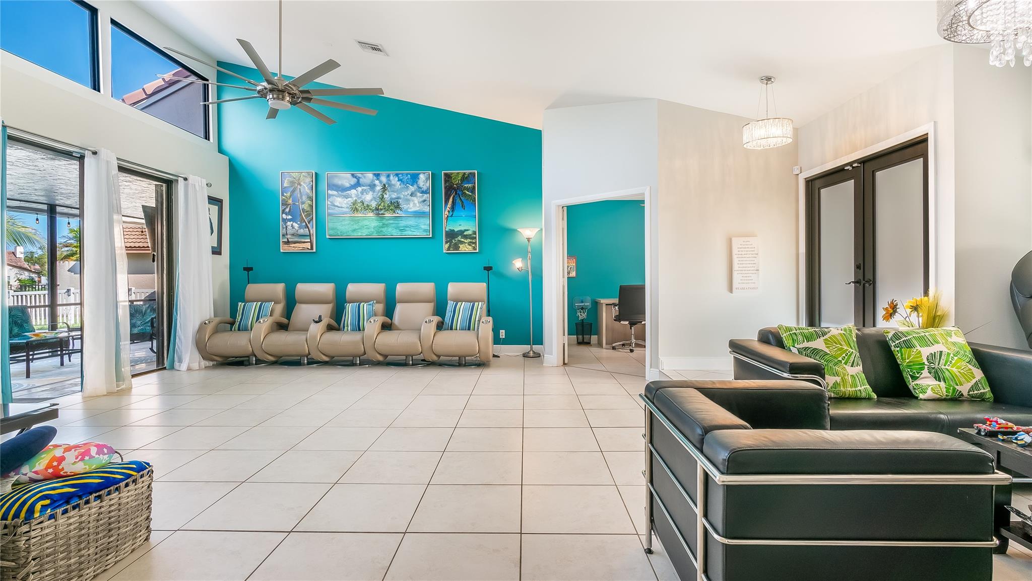 As you move towards the living area, the space unfolds into a grand expanse, perfect for entertaining or tranquil relaxation. The natural flow between these areas is accentuated by elegant flooring and an abundance of natural light, creating an inviting atmosphere that promises comfort and style.