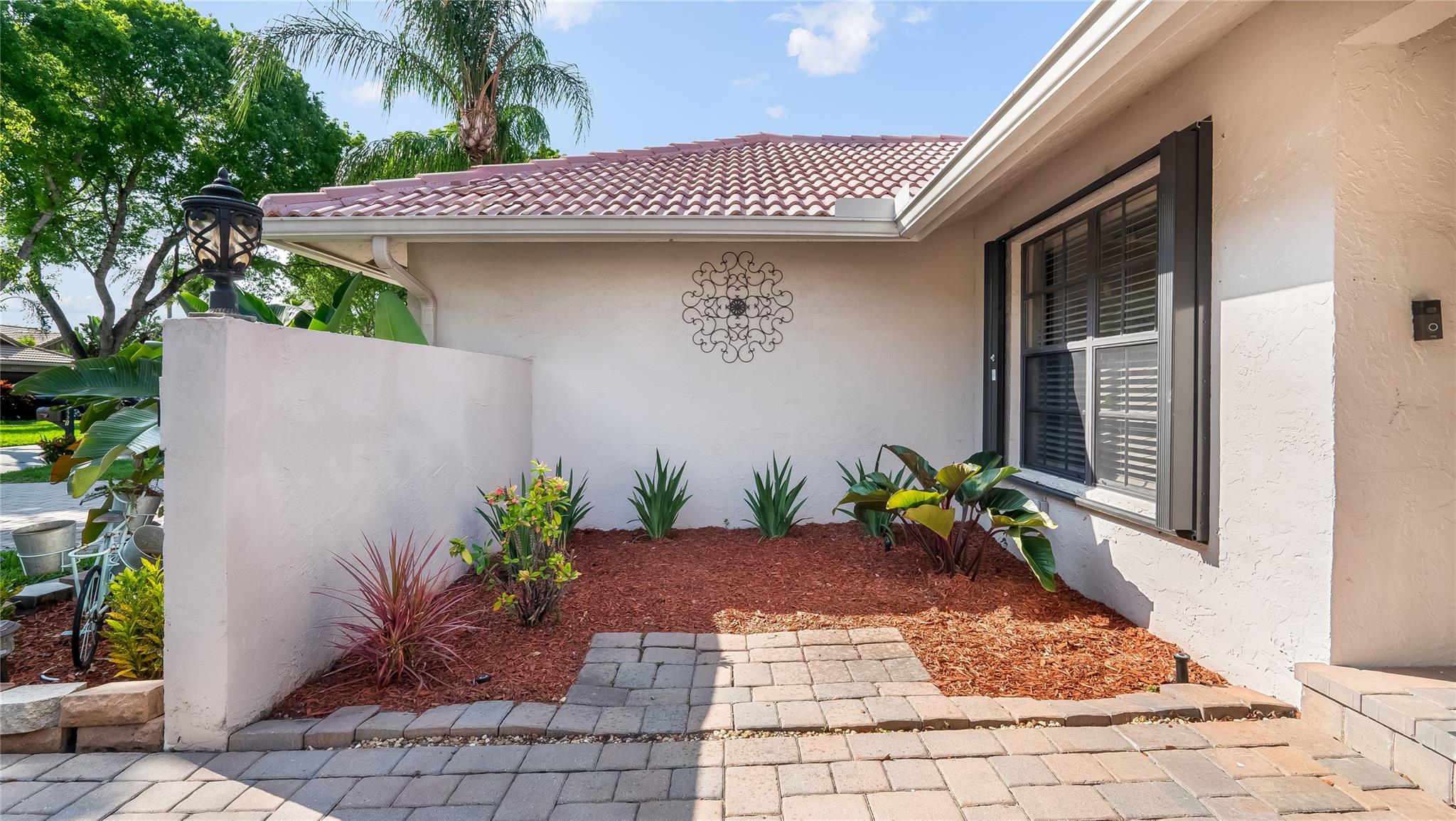 Enjoy the This home's curb appeal is further enhanced by its architectural details and the warm, welcoming atmosphere it exudes, promising a perfect blend of luxury and comfort.