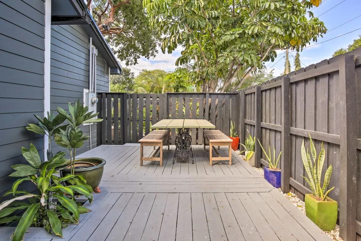 Outdoor dining area on wrap around deck