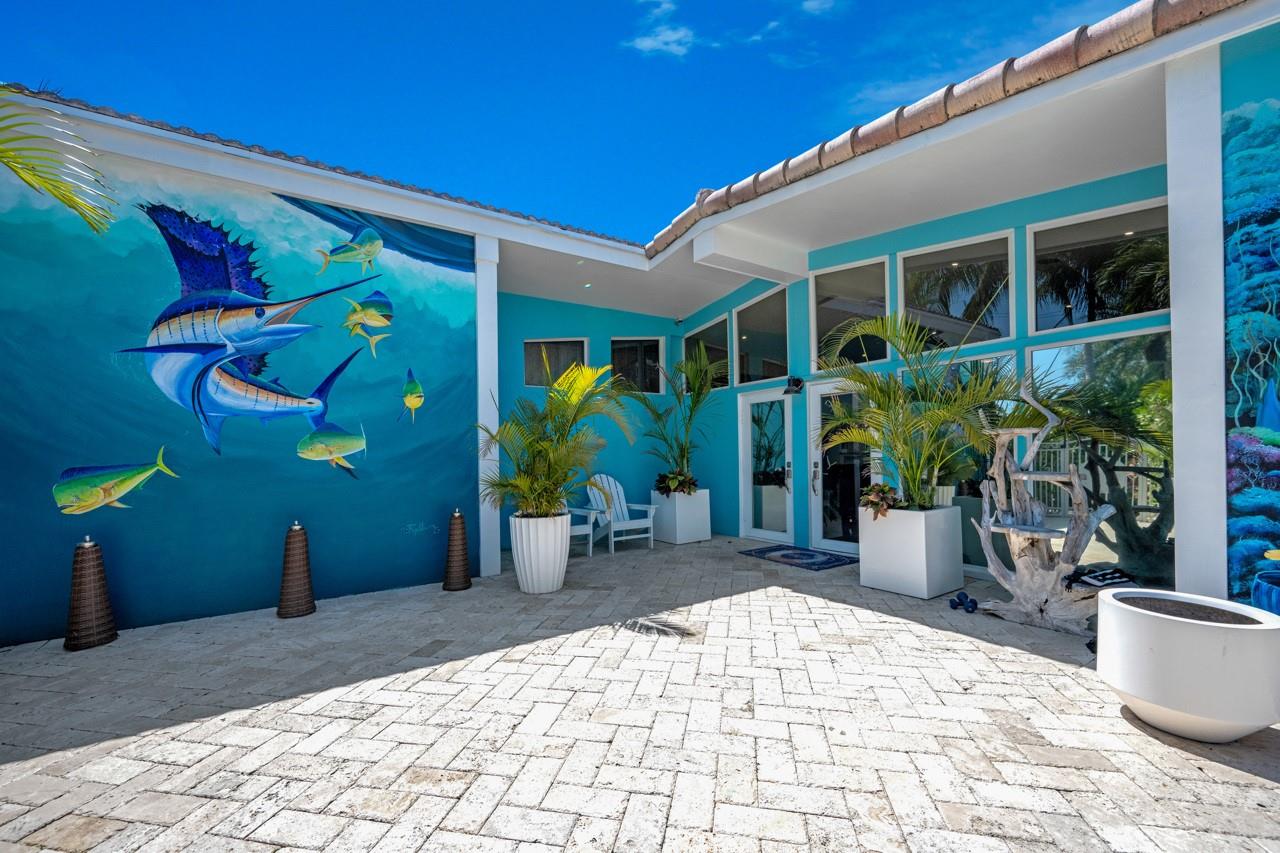 Front Door and Rollins Art Studio Mural, lit at night...stunning