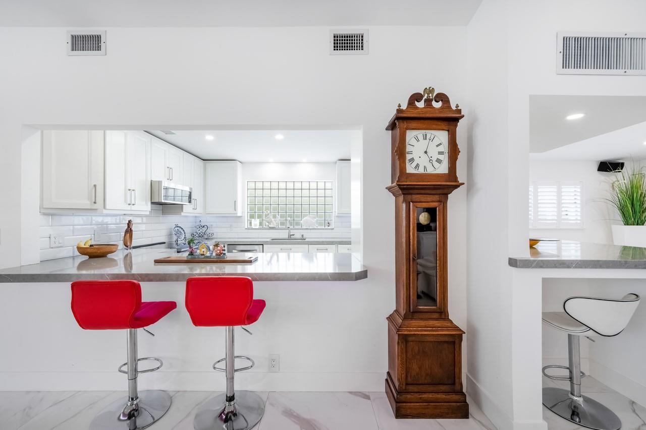 Counter height and Bar height seating around the well appointed Gourmet kitchen