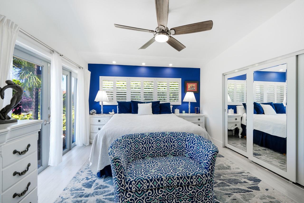 Master retreat w/ Water view and well lit gorgeous landscaping at night, large 10' Closet