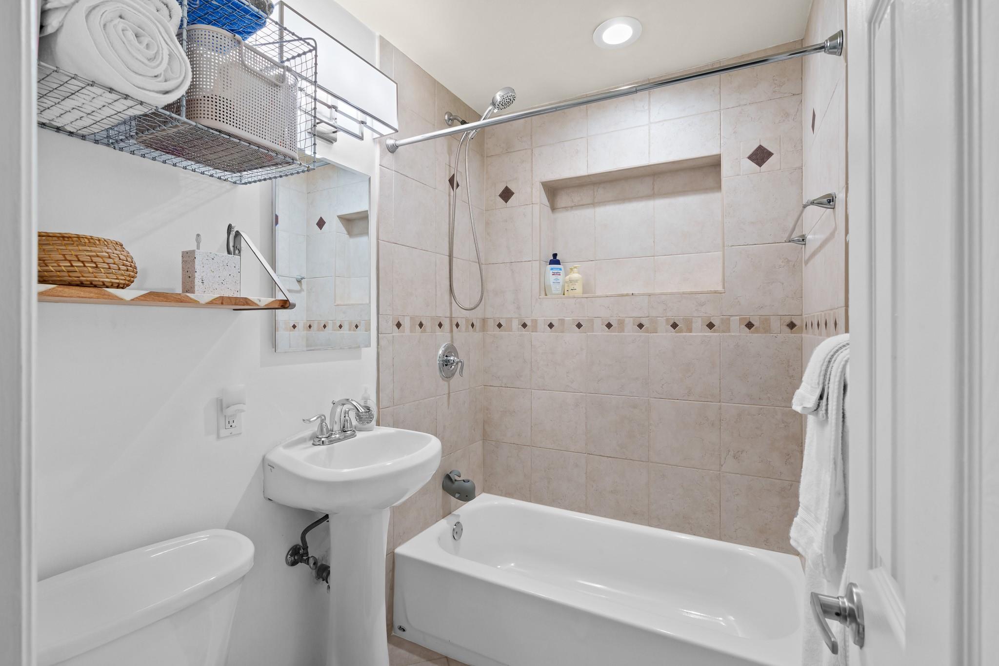 Hallway, guest bath with tub