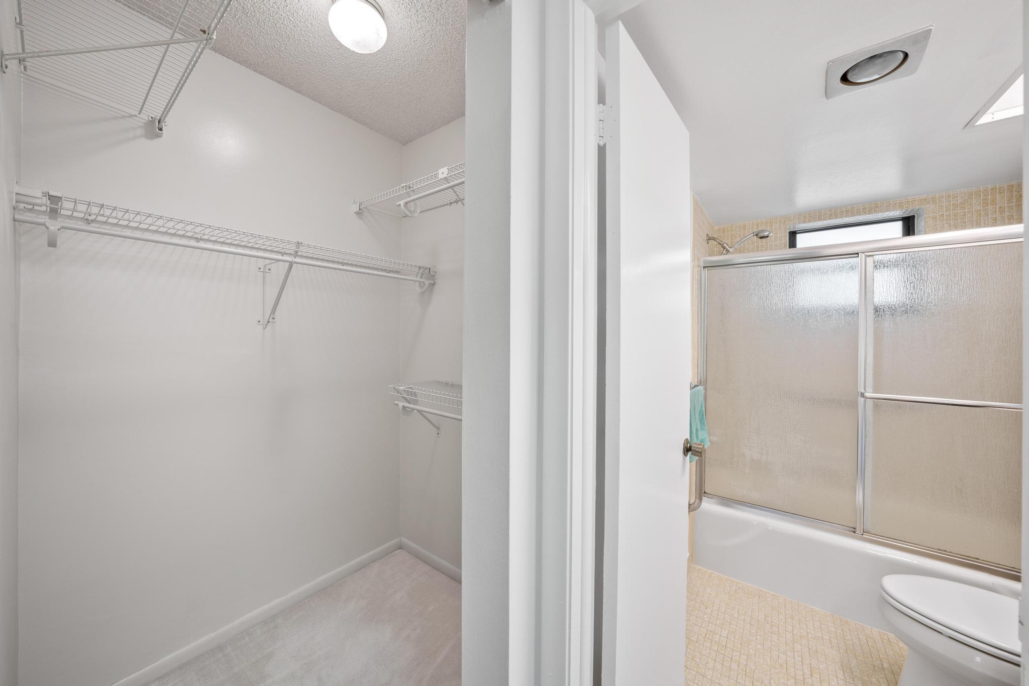 Primary bath and walk-in closet.