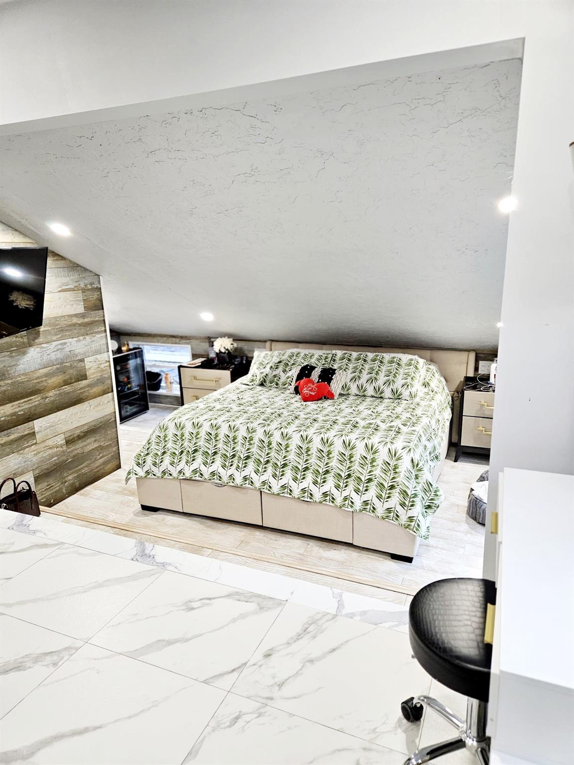 Wall covered by Armstrong wood on top of cook