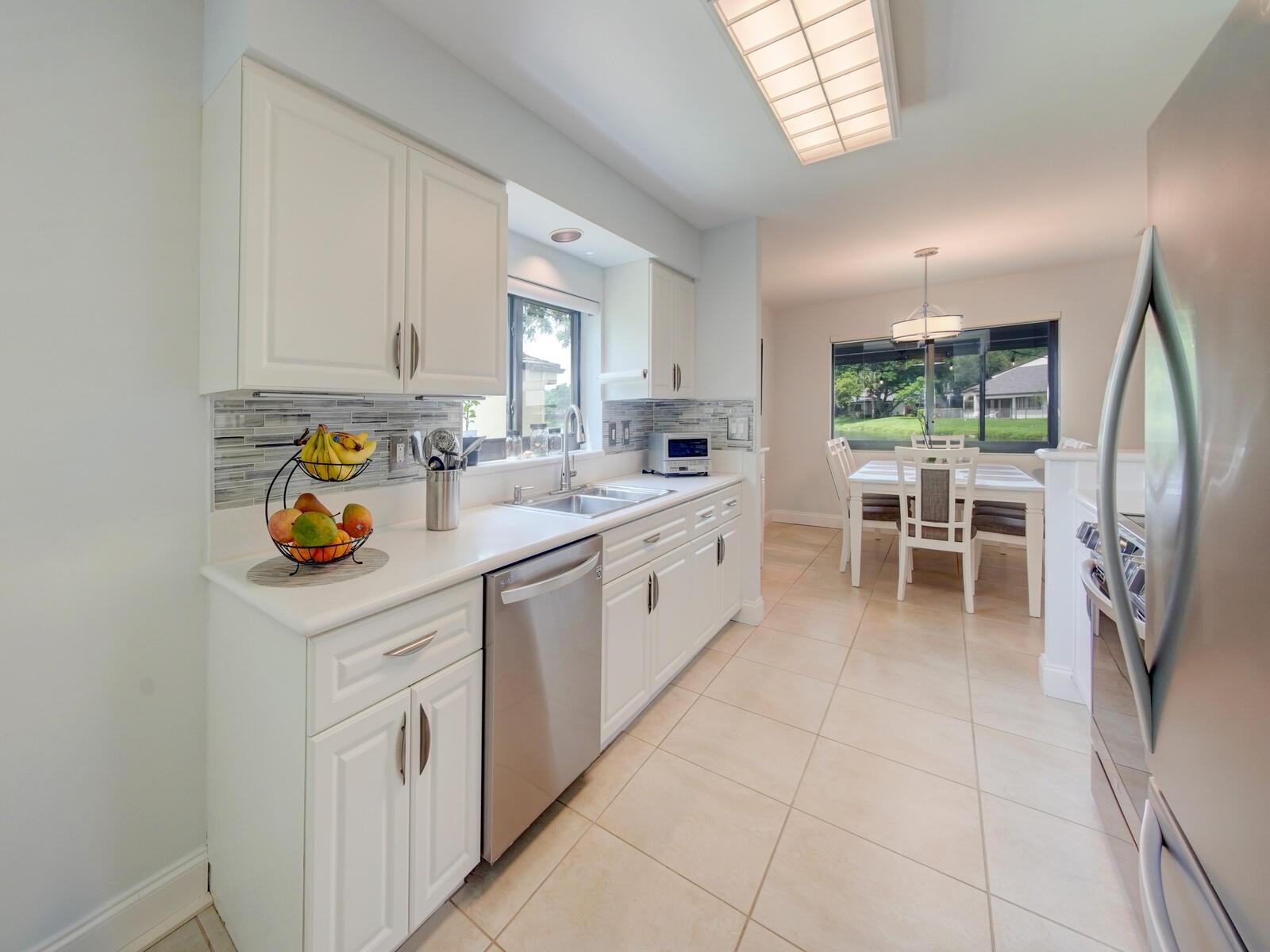 Ample kitchen cabinets and counter space.