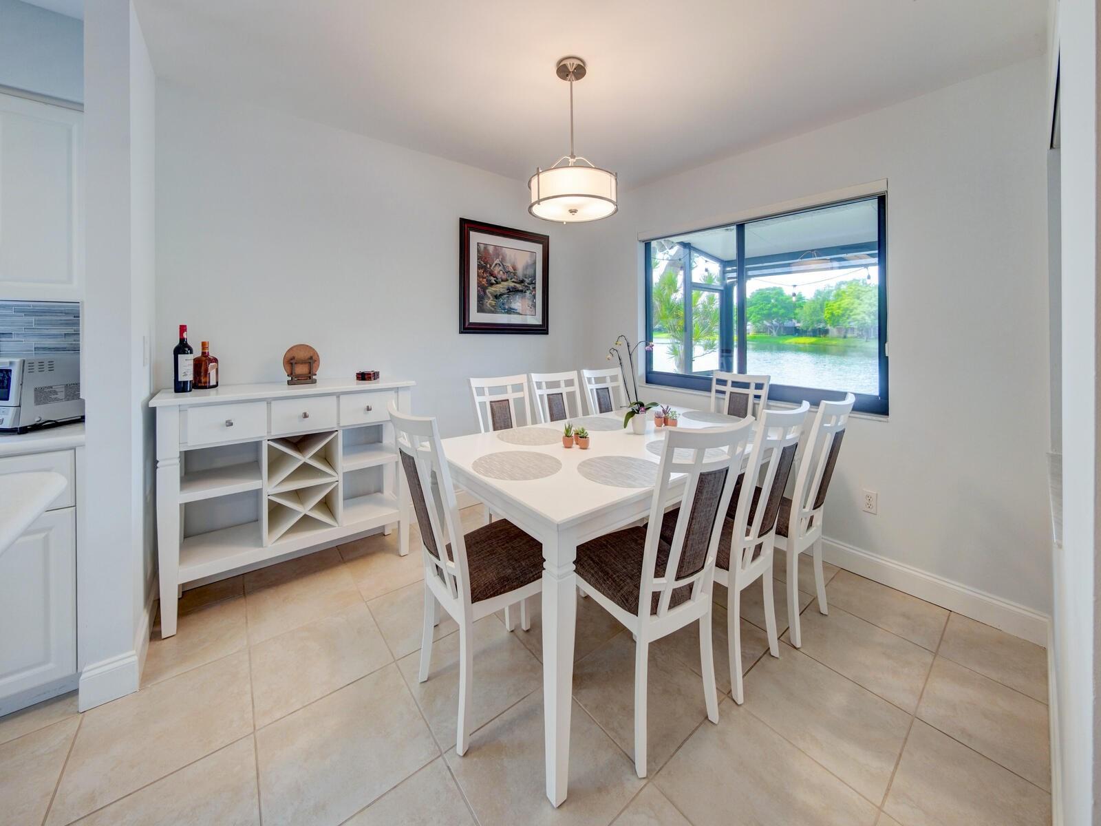 Formal dining room with natural unlight beaming in.