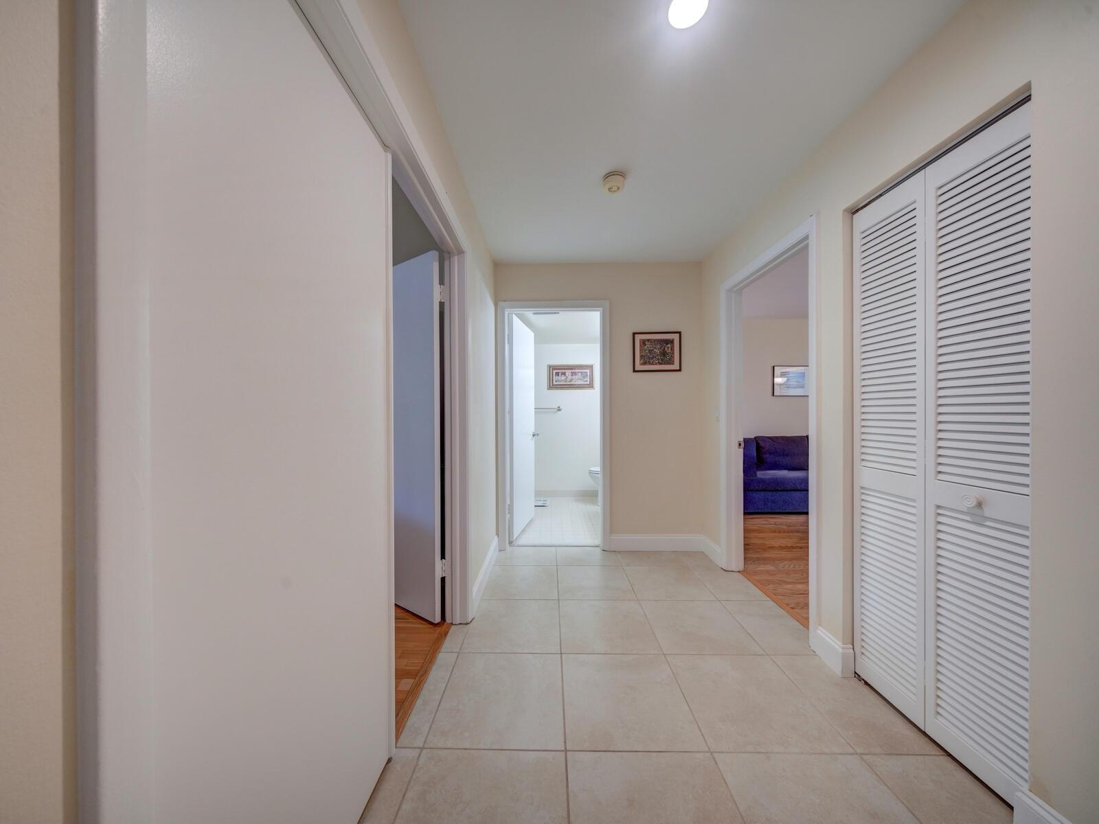 Tile and wood flooring throughout the home.