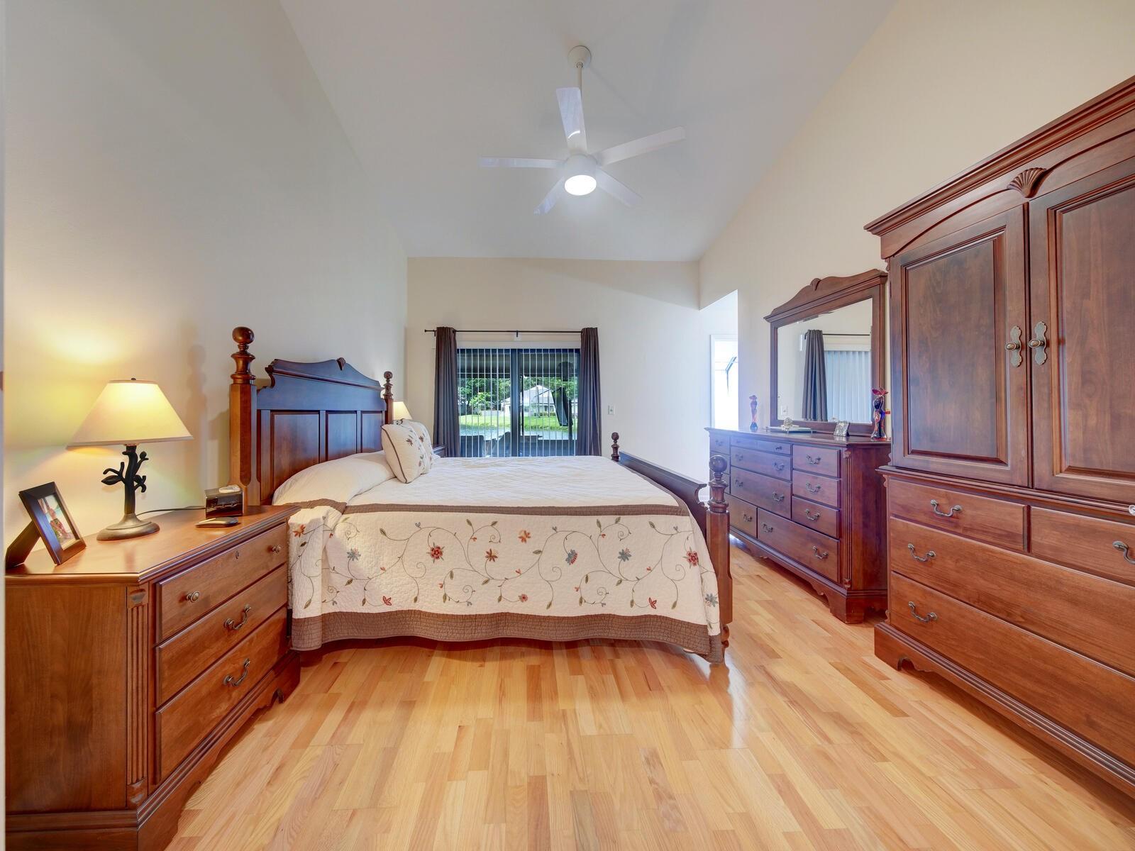 Master suite with vaulted ceilings, wood flooring and best of all Lake view!