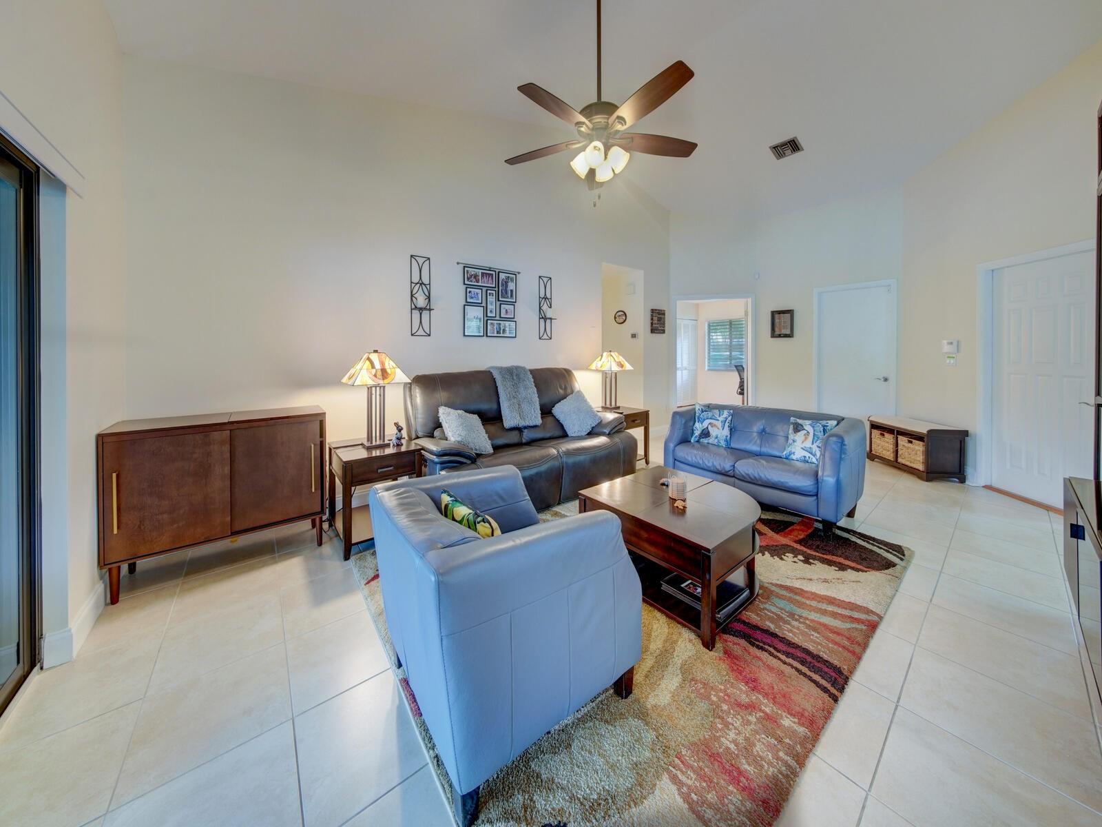 New impact sliding glass doors to huge screened and roofed patio!