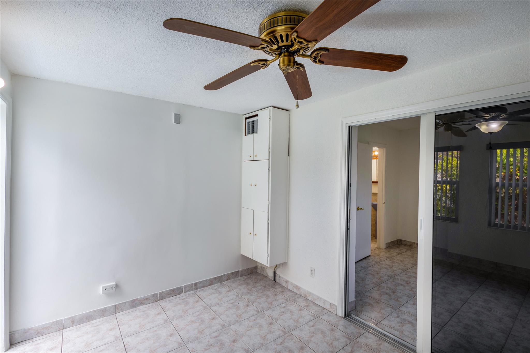 Kitchenette in the second bedroom with bran new< refrigerator, Microwave, induction hot plate and induction pans .