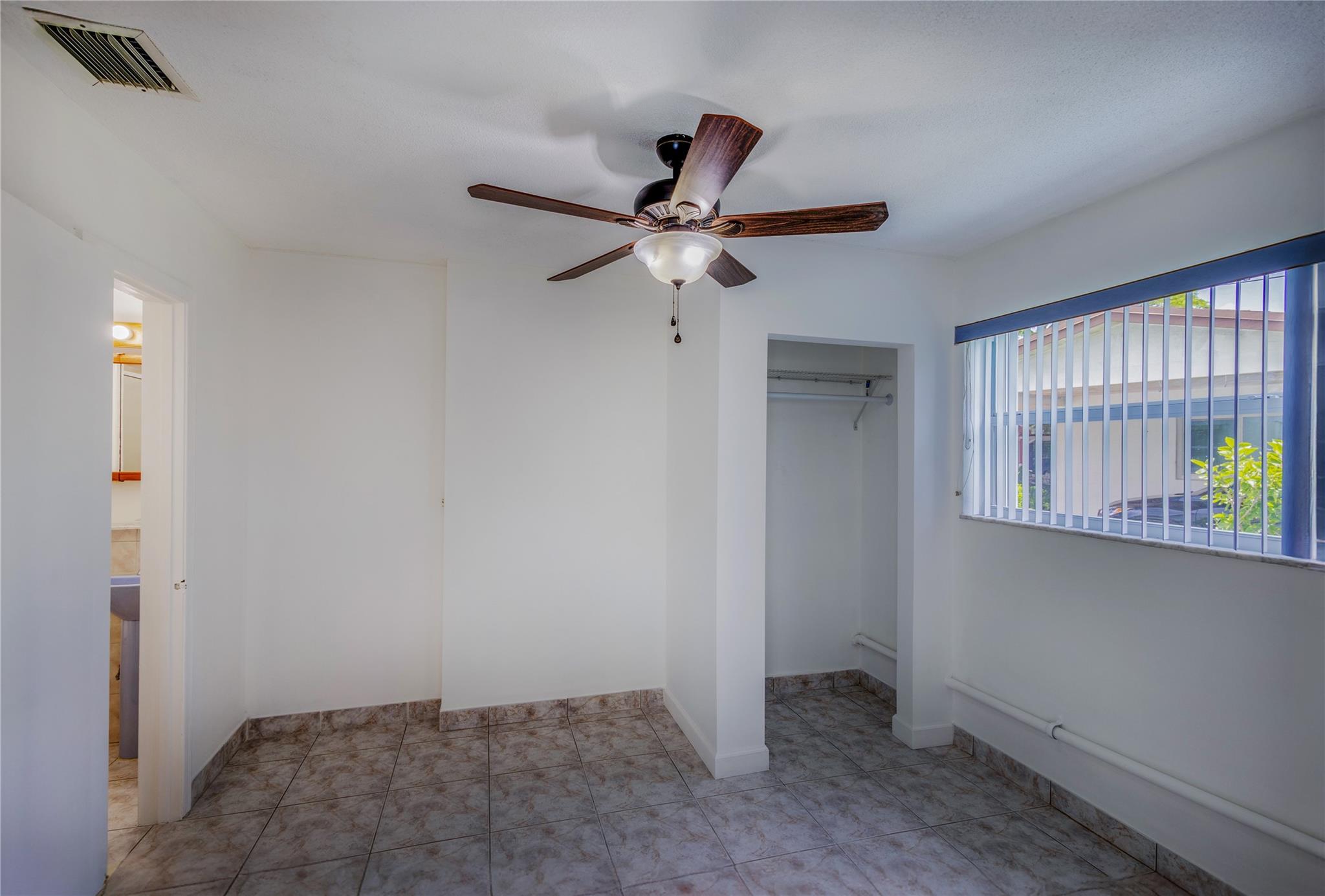 Kitchenette with Second bedroom view.