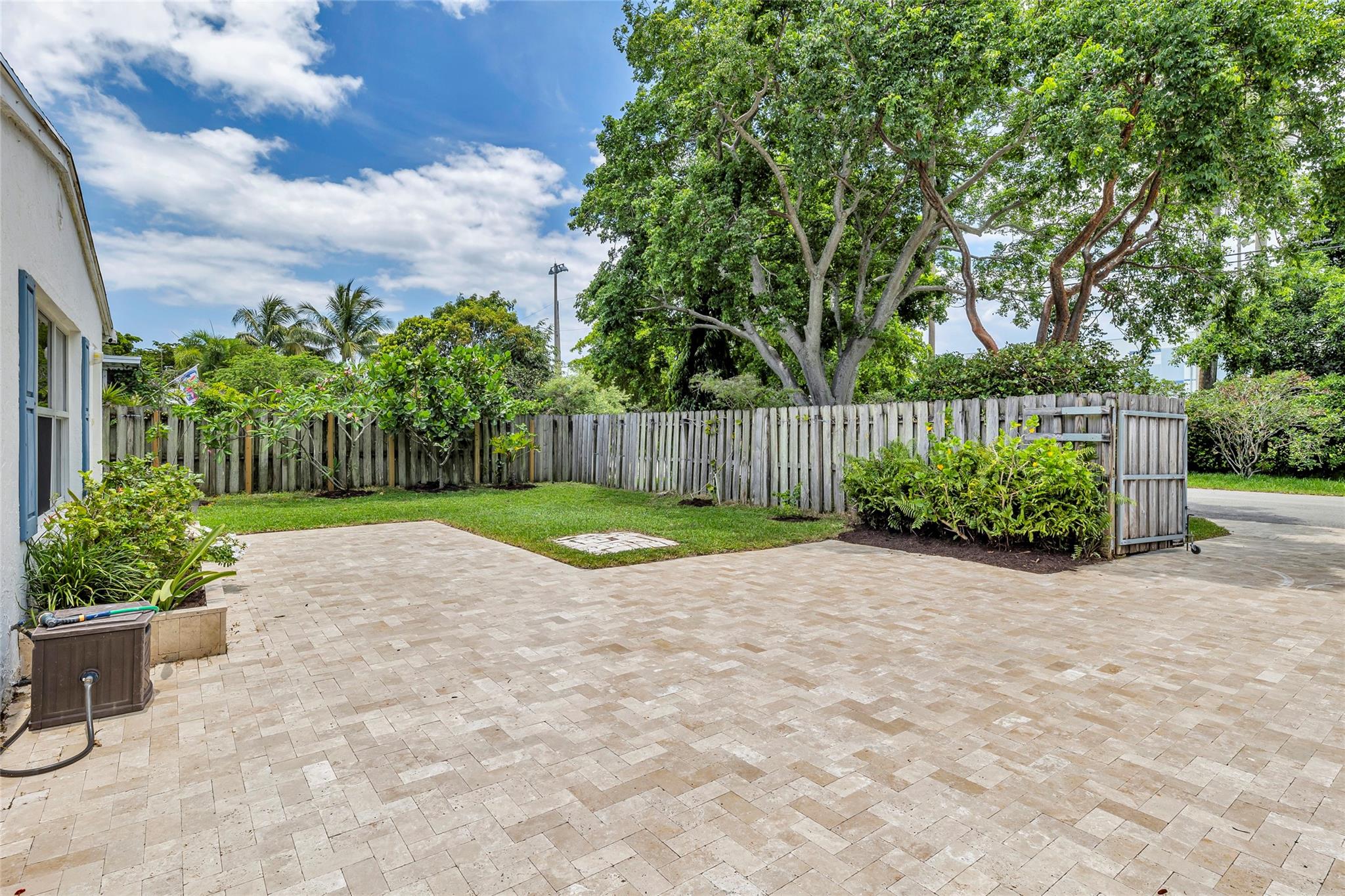 Large travertine front patio