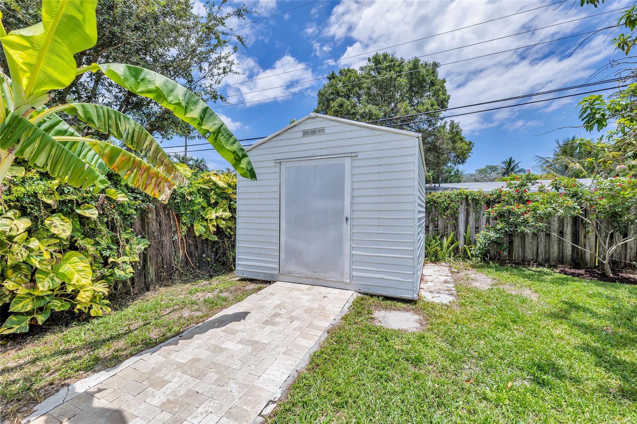 Shed with AC and electric.  Could be office, workshop, storage, etc.