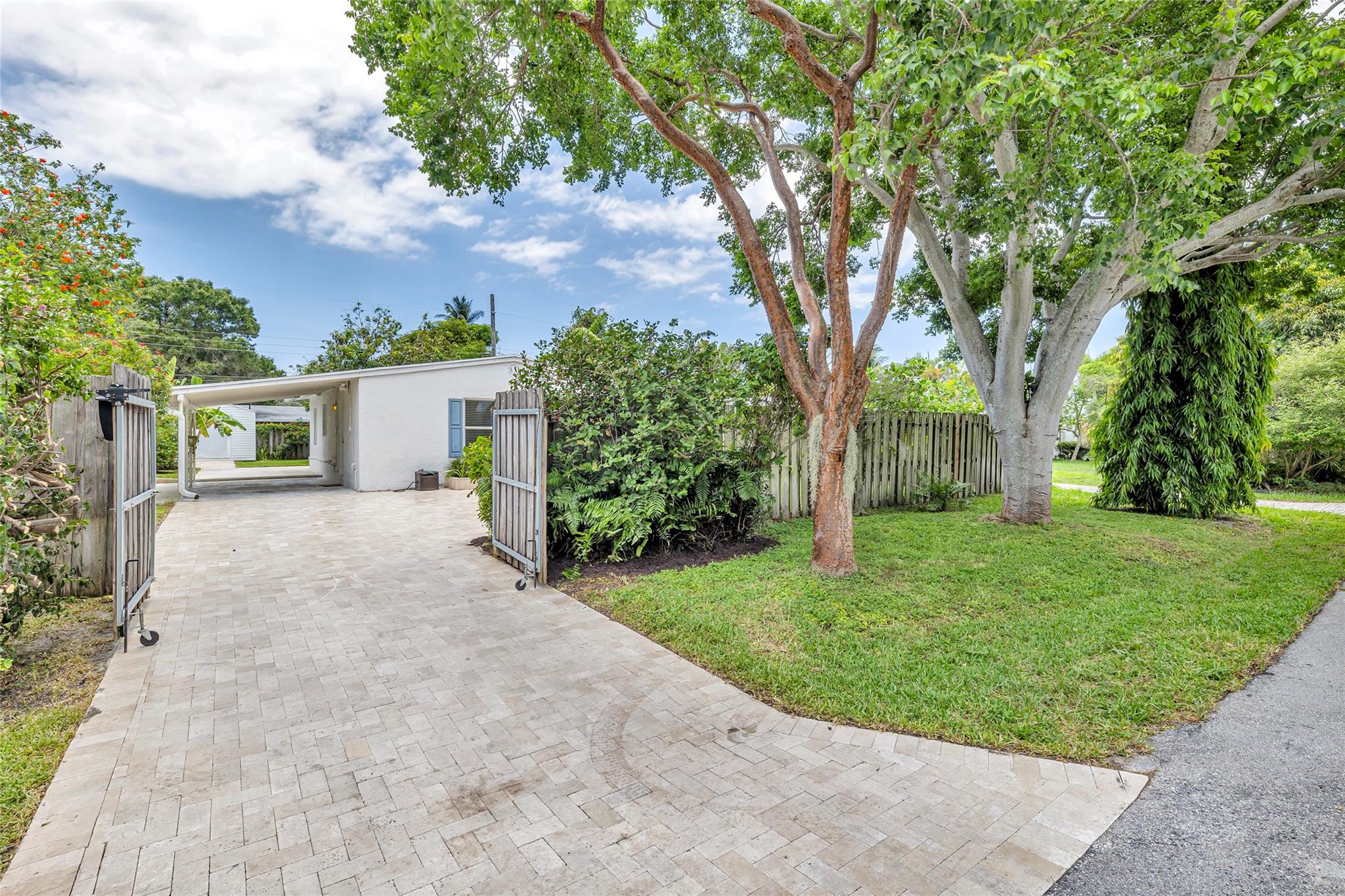 Long driveway and carport.  Room for a RV, boat or multiple cars.