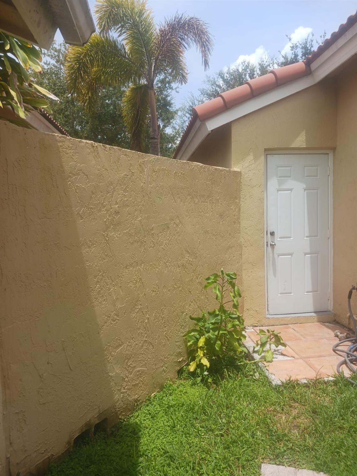 GARAGE DOOR FROM BACK PATIO