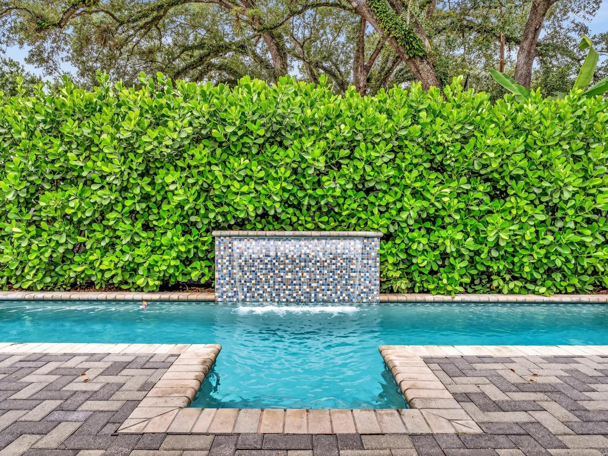 Heated pool with stay in place SWIM JETS and waterfall.