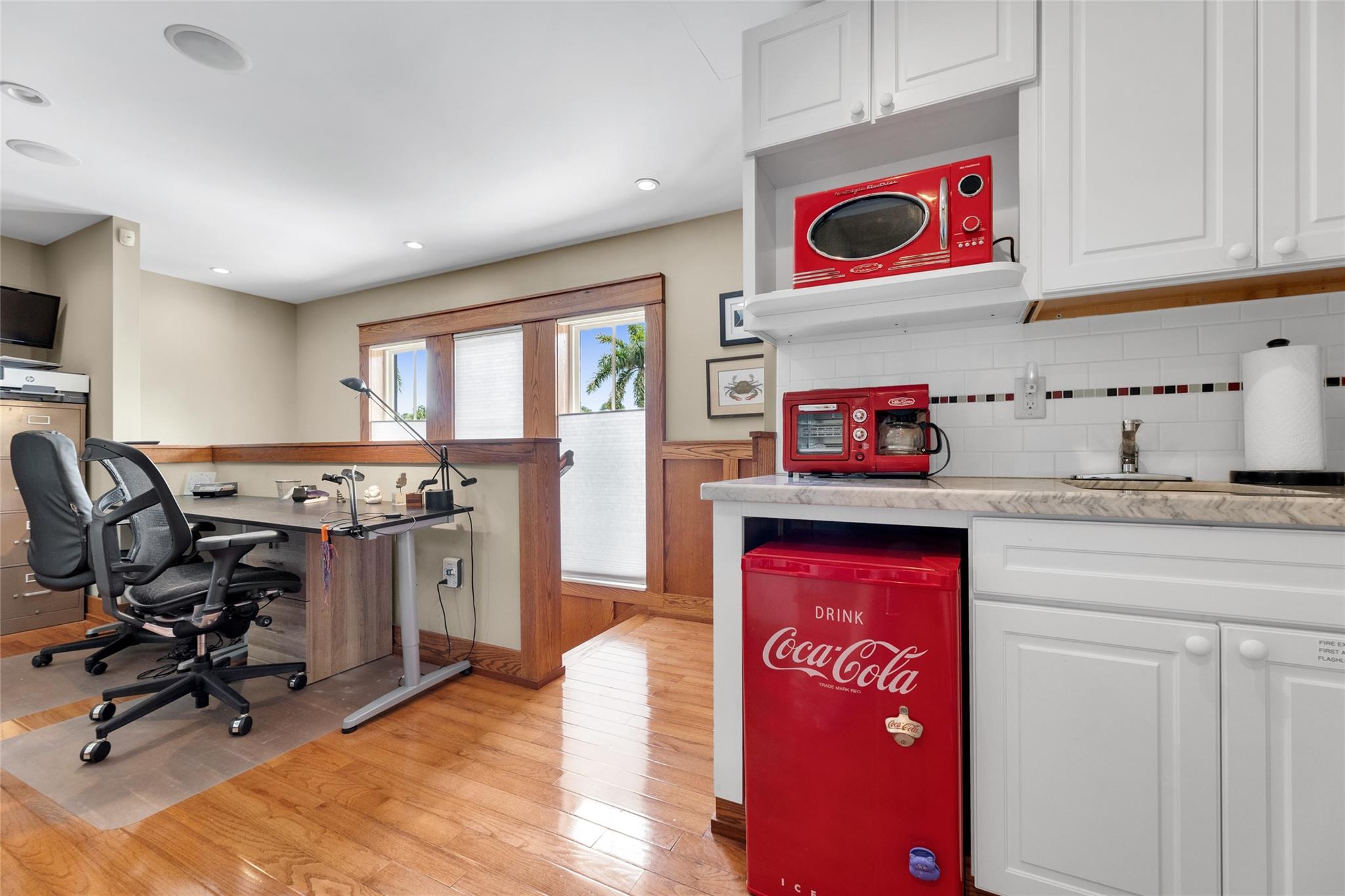 Office Loft and kitchen/bar area with sink