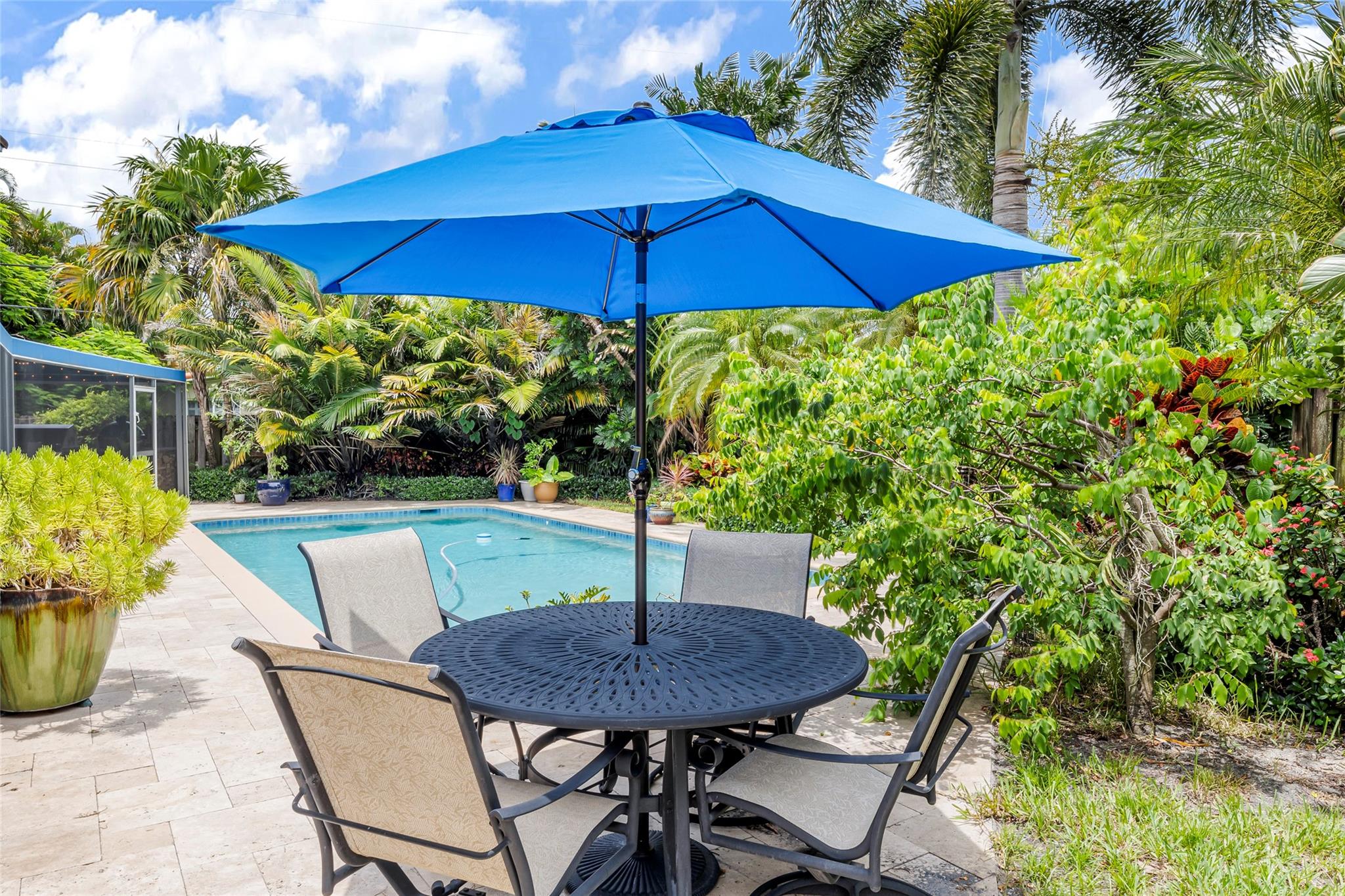 Outdoor seating area near pool