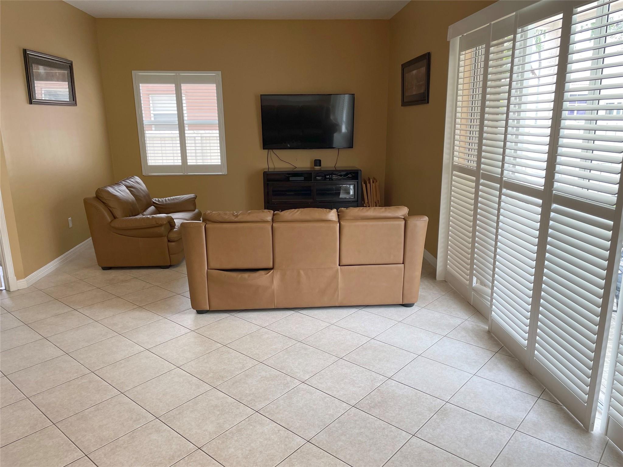 Family room near the Breakfast Area and Kitchen
