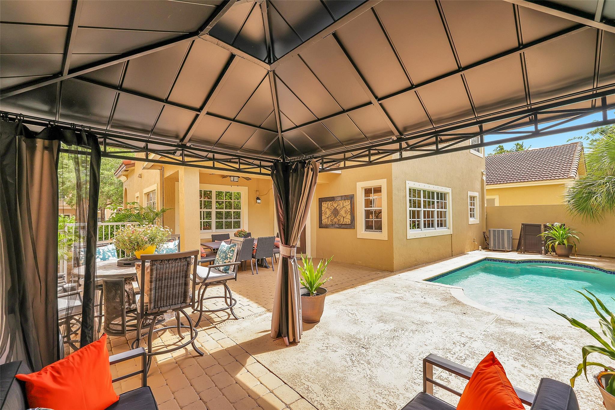 Grill while you lounge in your backyard Oasis