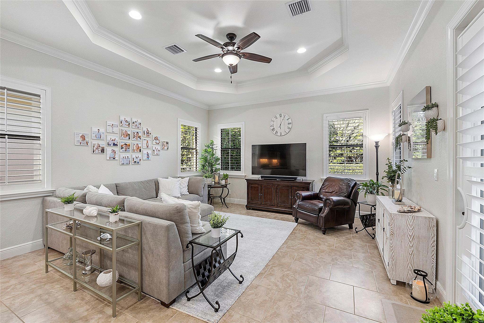 Large family room with lots of windows for natural lighting,