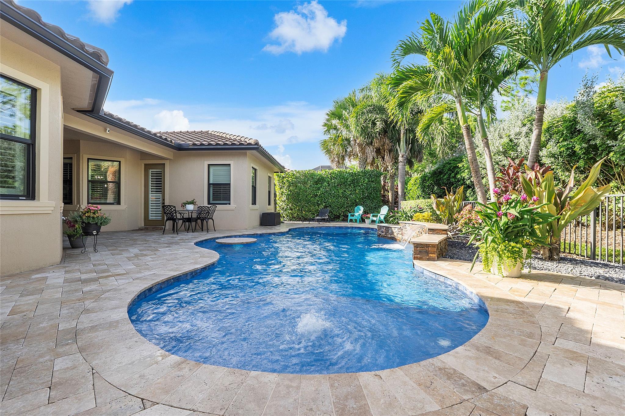 Take a private swim in this sapphire blue tropical heated pool.