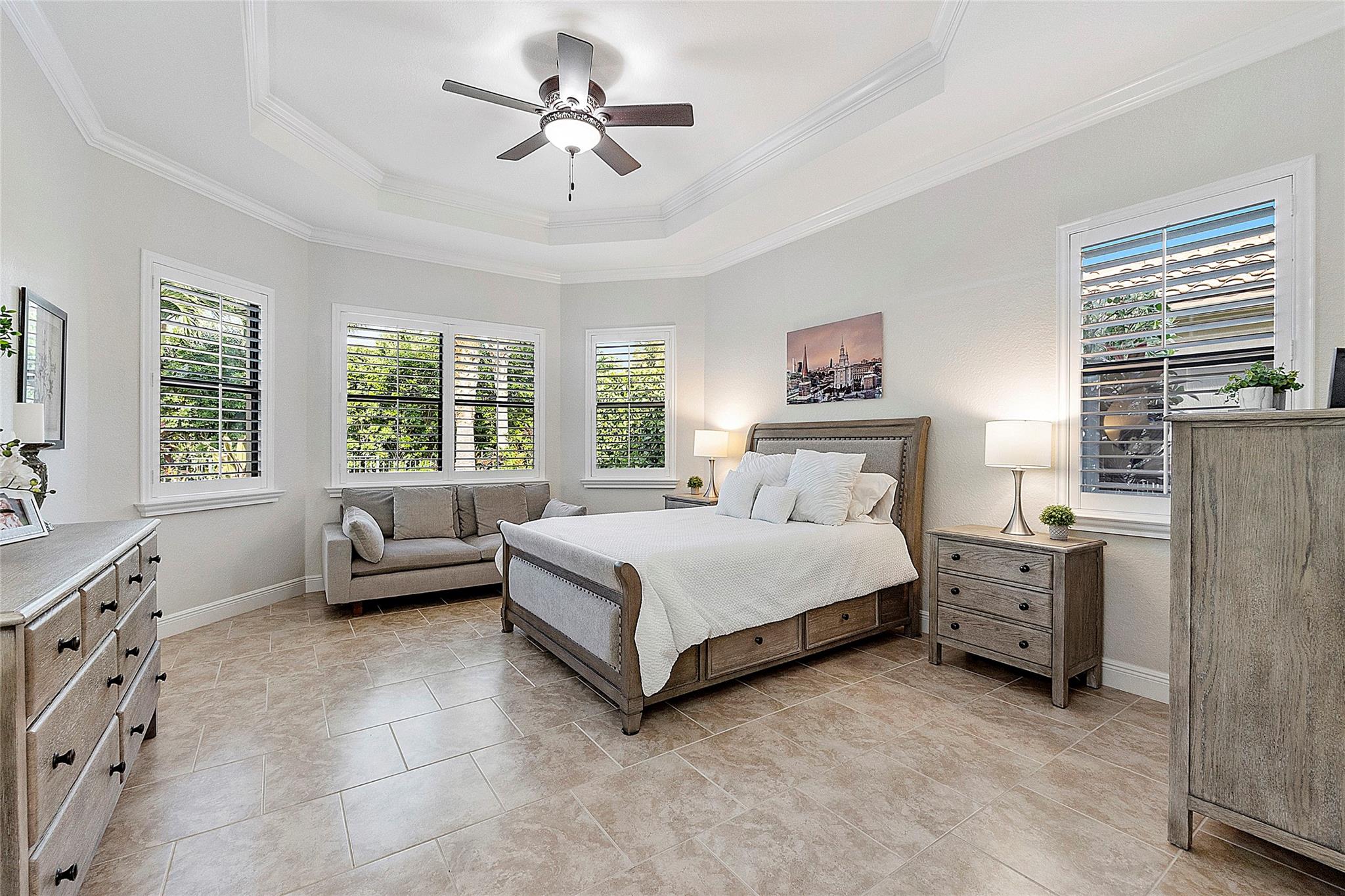 Master bedroom with pretty bay window overlooking the pool for a midnight tranquil swim