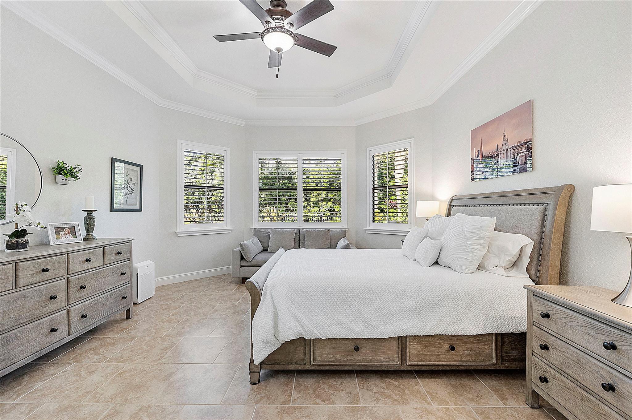 spacious master bedroom with bay window