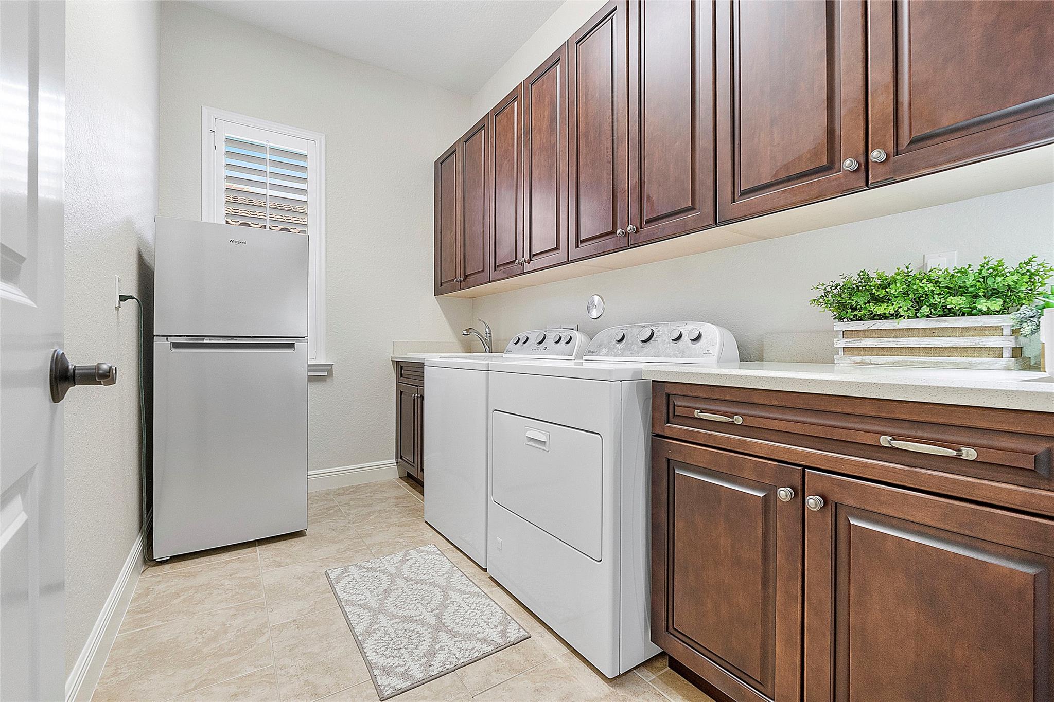 Laundry room with tons of storage and slip sink,