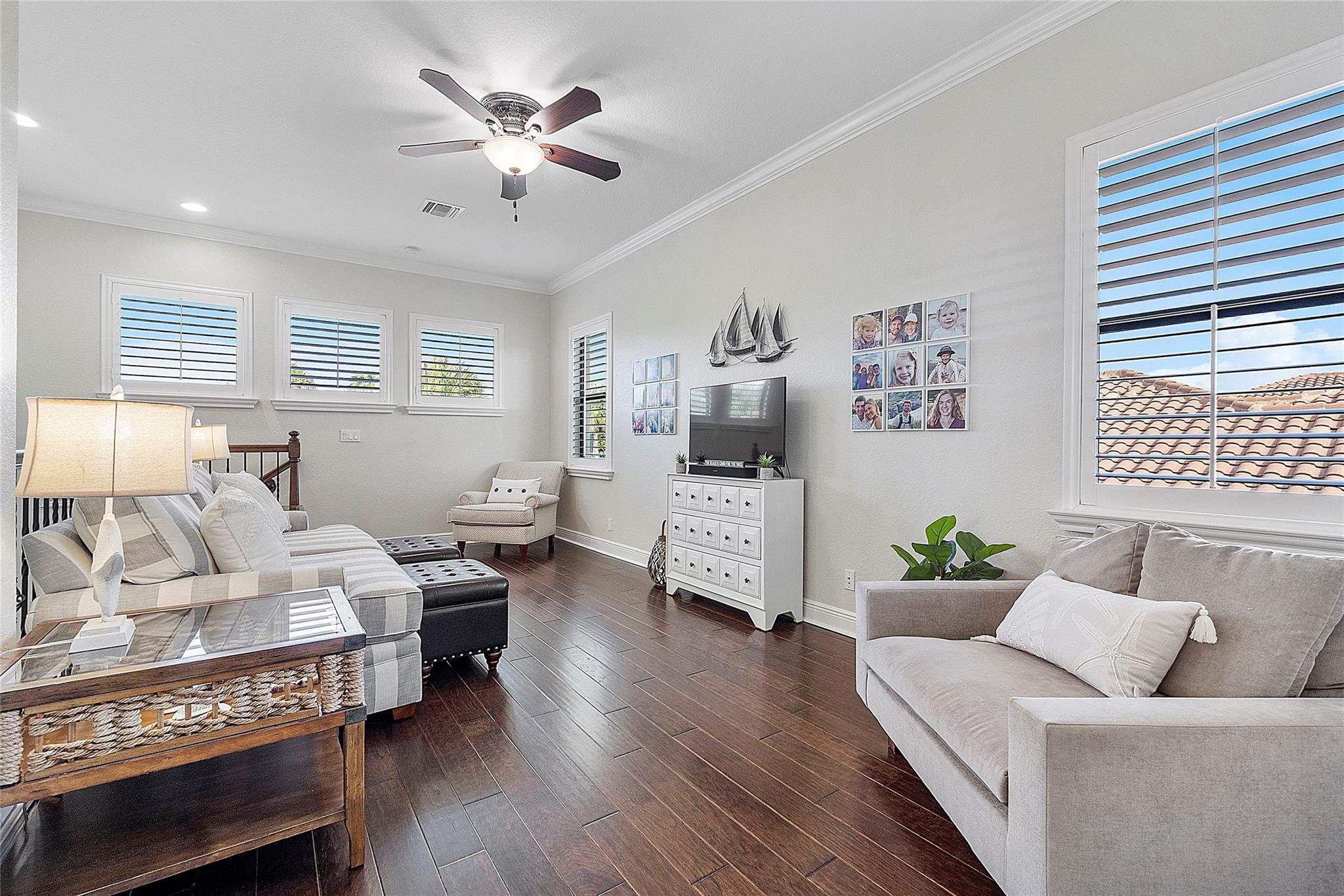 Pretty loft with cosy coastal windows , Strong solid durable porcelain plank flooring (waterproof) crown moldings