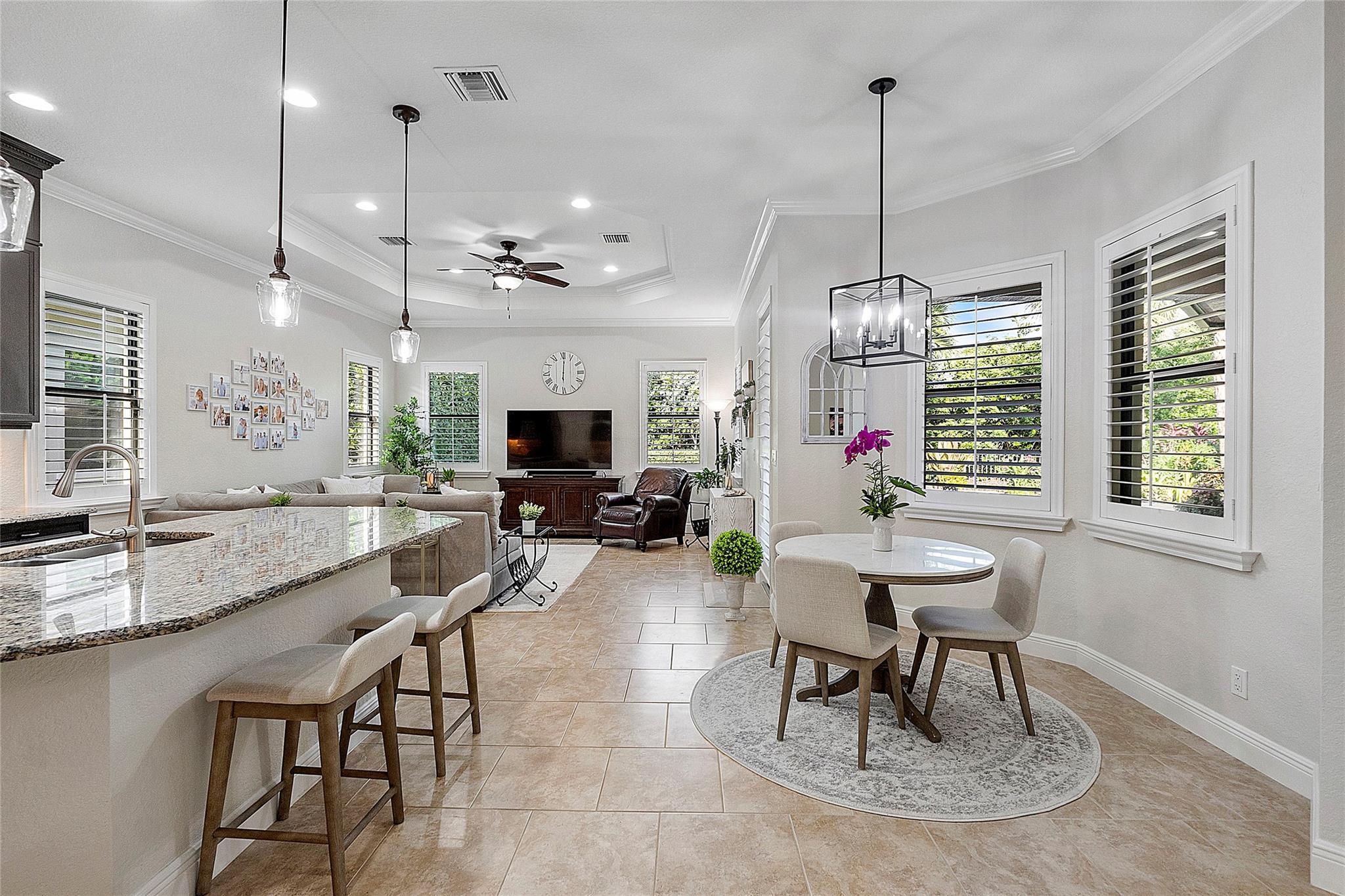 The family room, kitchen, dining & living room are all open floorplan in this Laurel model,