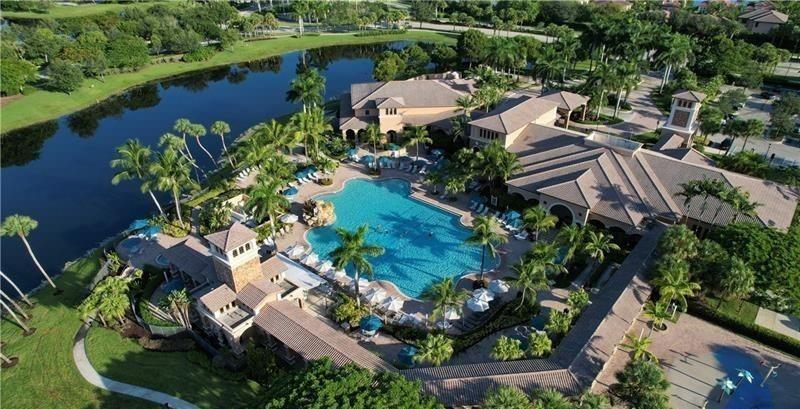 An Aerial view of just 1 of our clubhouses inside Heron Bay, If you are a resident you can use any of the facilities for no charge,