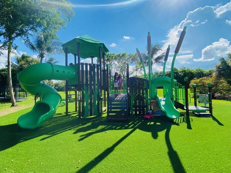 This little park play area is located next to the Commons clubhouse on the opposite side of the tennis courts, Lots of friends are made at this little spot,